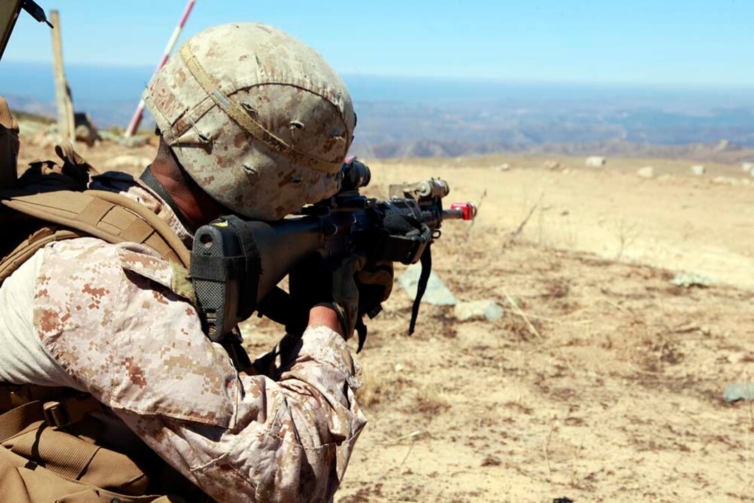 Private First Class Arley E. Duran, rifleman, 3rd Squad, 1st Platoon, Kilo Company, Battalion Landing Team 3/5, 15th Marine Expeditionary Unit, provides security before the squad cleared the town, as part of the unitâ€™s final pre-deployment training, Certification Exercise, Aug. 27. Certification Exercise was different than the previous exercises the MEU conducted as part of their pre-deployment training. During this training, the Marines and Sailors did not know what was on the training schedule and were expected to react to scenarios quickly using the Marine Corpsâ€™ Rapid Response Planning Process to prepare for the missions the unit will execute.
Duran, 18, is from Los Angeles.