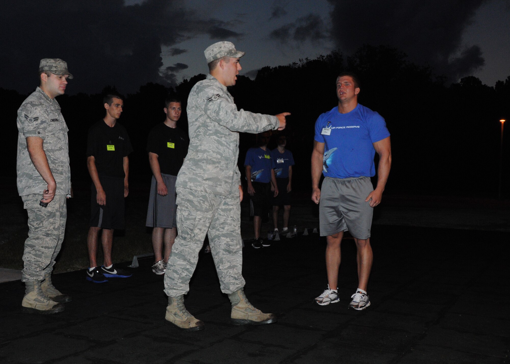 A trainee with the 315th Airlift Wing Development and Training Flight receives instructions from a DTF volunteer instructor during the 315th Airlift Wing’s Development and Training Flight unit training assembly weekend Aug. 4, 2012 at Joint Base Charleston, S.C. DTF participation is mandatory for all newly enlisted Airmen and serves as part of their enlistment into the inactive Reserve while awaiting positions to open in Basic Military Training. (U.S. Air Force Photo/Staff Sgt. Shane Ellis)