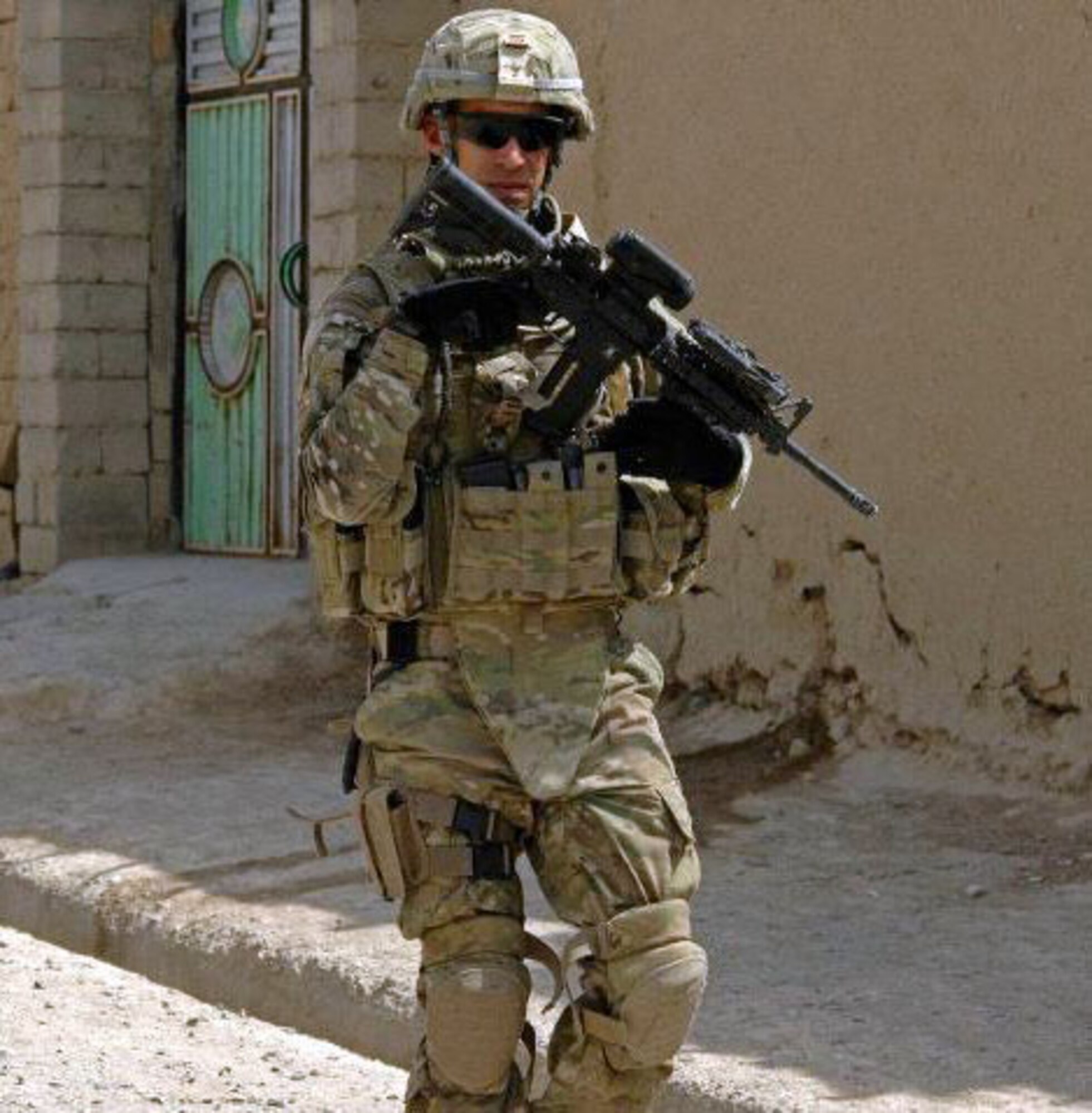 Tech. Sgt. Kenneth Wright, 509th Logistics Readiness Squadron vehicle maintenance low bay NCO in charge, takes part in a security patrol during his deployment to Afghanistan. Wright was deployed from June 2011 until March 2012. (Courtesy Photo) 