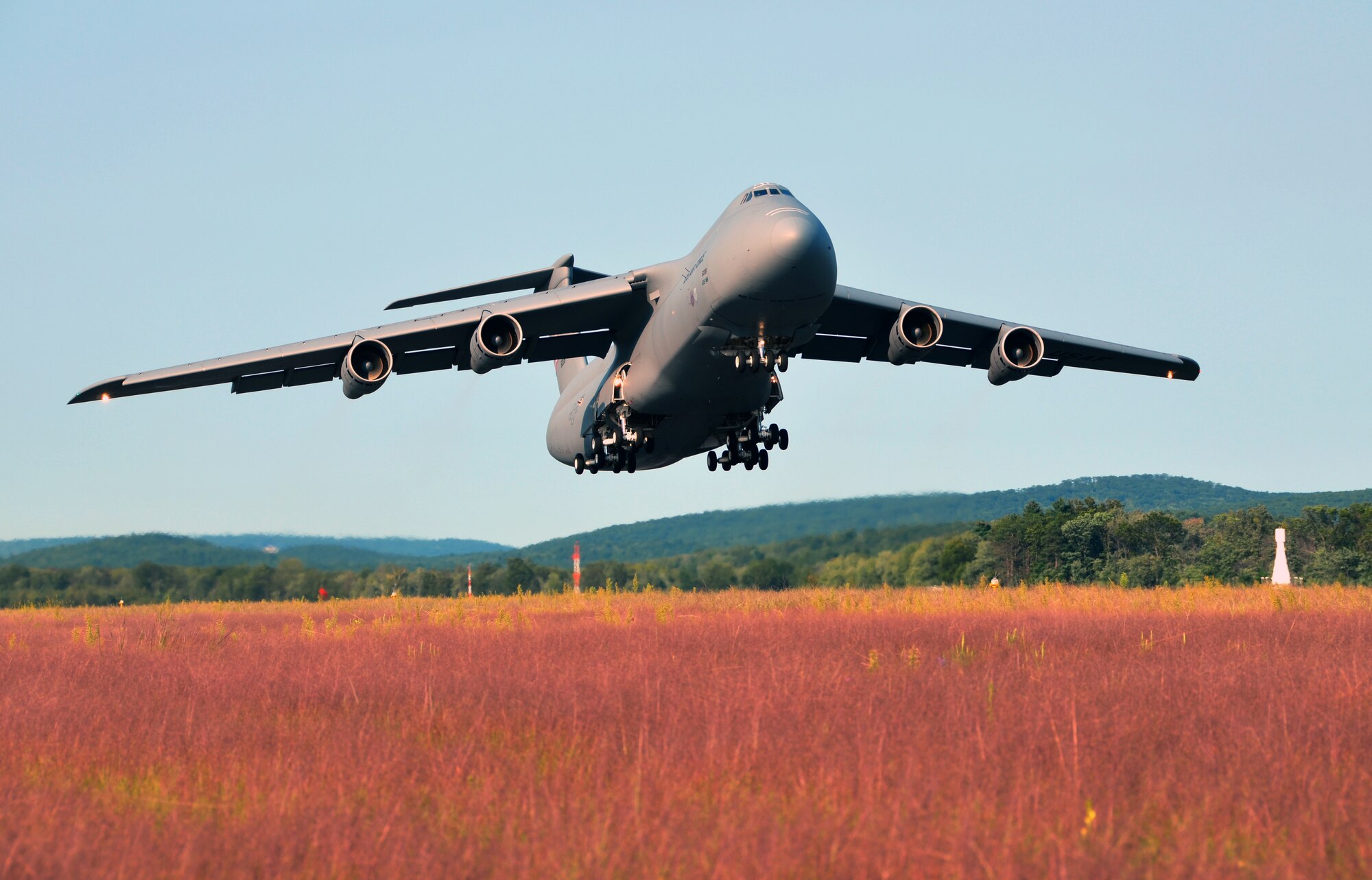 A Westover C-5 Galaxy climbs into the western Massachusetts skies for a local training mission Aug. 30. C-5 aircrews regularly train to hone their skills to keep them mission ready. (U.S. Air Force photo by SrA. Kelly Galloway)