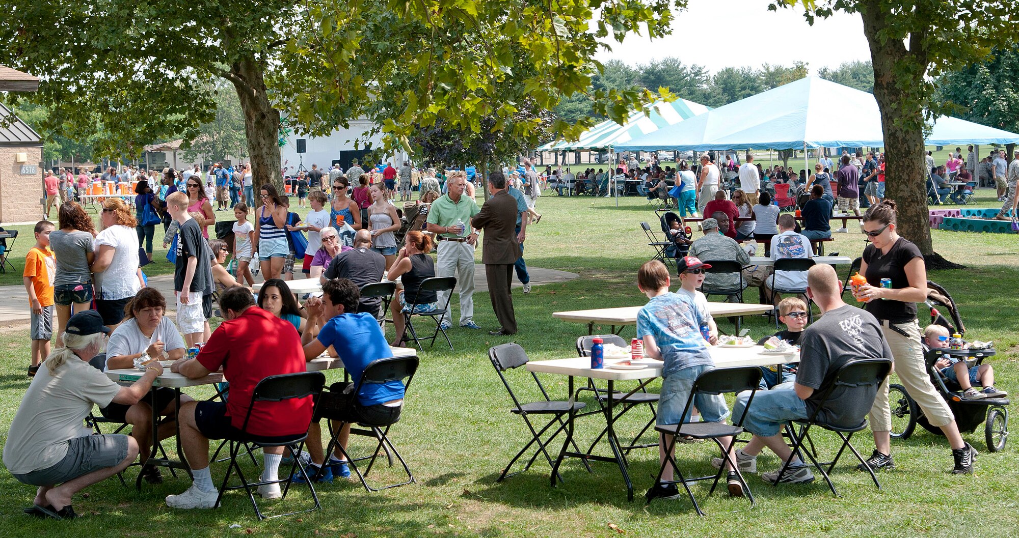 Military and civilian members of Joint Base McGuire- Dix-Lakehurst, N.J., gather Aug. 24 at the Annual Summer Picnic on Doughboy Field. This is the second JB MDL picnic since the establishment of the joint base. (U.S. Air Force photo by Russ Meseroll/Released)
