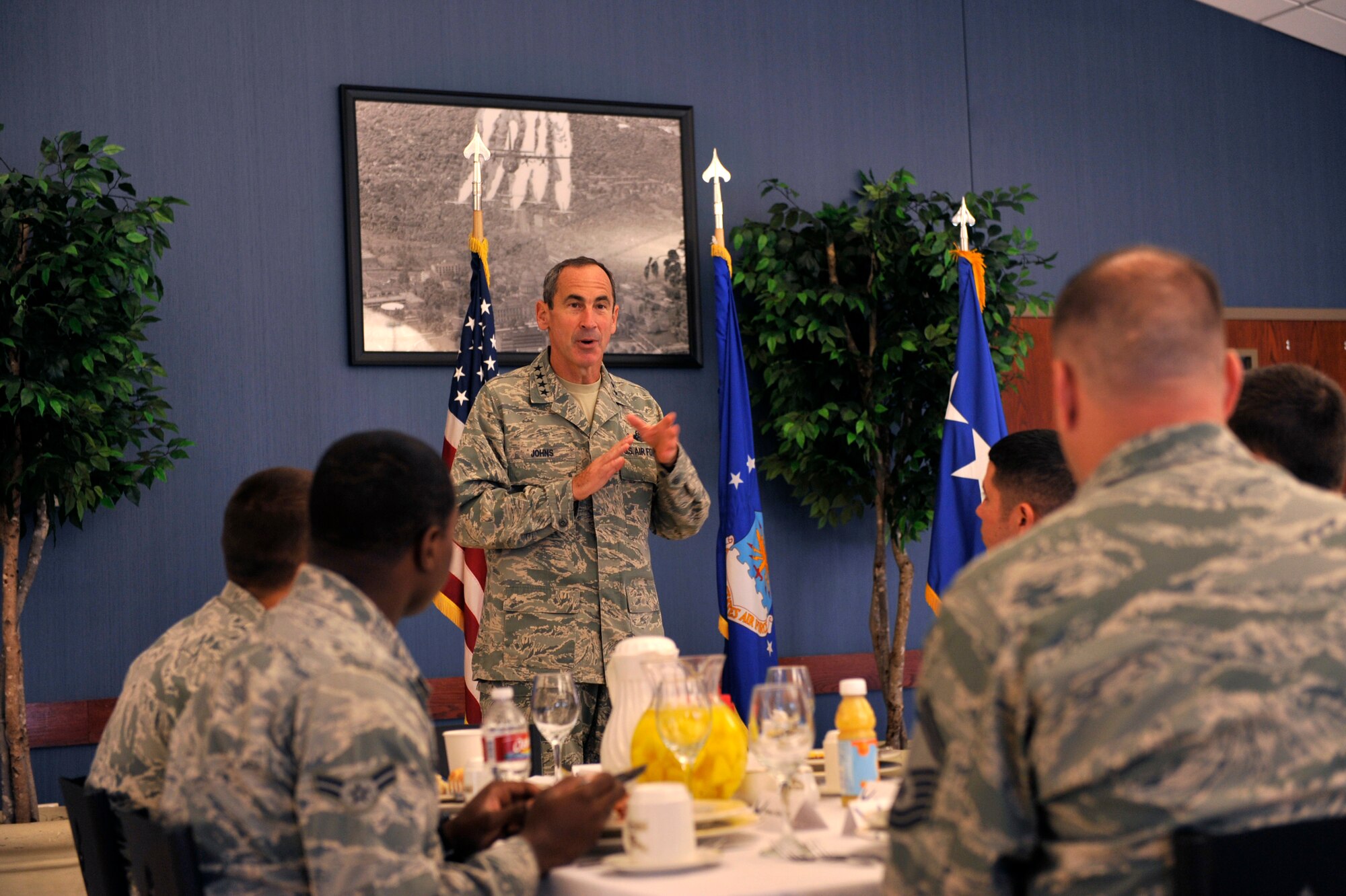 Gen. Raymond Johns, Air Mobility Command commander, speaks to Airman inside the Hercules Dinning Facility Aug. 30, 2012, at Little Rock Air Force Base, Ark. At the Hercules Dinning Facility, Johns spoke to 15 Team Little Rock Airmen and held a question and answer session. (U.S. Air Force photo/Airman 1st Class Rusty Frank)