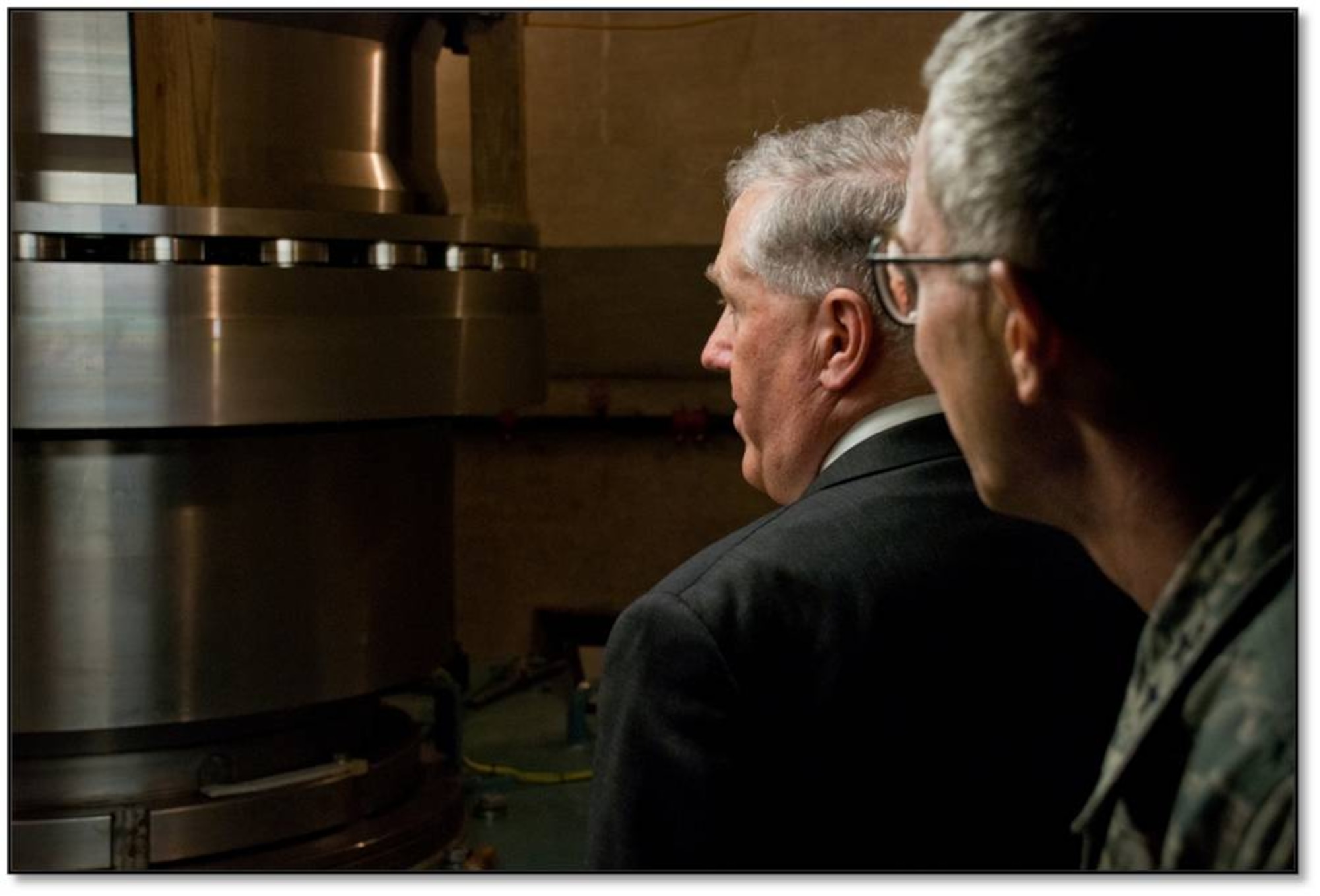 Maj. Gen. McCasland looks on as Under Secretary Frank Kendall tours the 711 HPW Centrifuge in Building 852 on August 29.