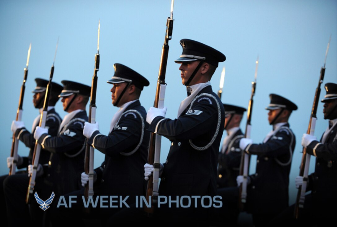 U.S. Air Force Honor Guard Drill Team performs at a U.S. Air Force Band concert at the Air Force Memorial in Washington D.C., Aug. 24, 2012. Throughout the summer months of June, July, and August, the band's performing ensembles present free outdoor concerts at historic venues in our nation's capital for Washington area residents, as well as for visitors from around the world. (U.S. Air Force photo/Senior Airman Christina Brownlow)

