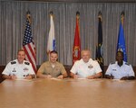 Senior leaders from each of the military services in San Antonio kickoff the 2012 Combined Federal Campaign during a signing ceremony Aug. 27 at JBSA-Randolph.  From left are: Army Maj Gen Walter L. Davis,, United States Army North deputy commanding general; Marine Maj Martin D. Gale, Inspector-Instructor Staff executive officer, Navy Capt. John D. Larnerd Jr., Navy Medicine Training Center commanding officer; and Air Force Gen. Edward A. Rice Jr., Air Education and Training Command commander.  The 2012 CFC begins Sept. 1st. (U.S. Air Force photo by Richard McFadden)