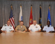 Senior leaders from each of the military services in San Antonio kickoff the 2012 Combined Federal Campaign during a signing ceremony Aug. 27 at JBSA-Randolph.  From left are: Army Maj Gen Walter L. Davis,, United States Army North deputy commanding general; Marine Maj Martin D. Gale, Inspector-Instructor Staff executive officer, Navy Capt. John D. Larnerd Jr., Navy Medicine Training Center commanding officer; and Air Force Gen. Edward A. Rice Jr., Air Education and Training Command commander.  The 2012 CFC begins Sept. 1st. (U.S. Air Force photo by Richard McFadden)