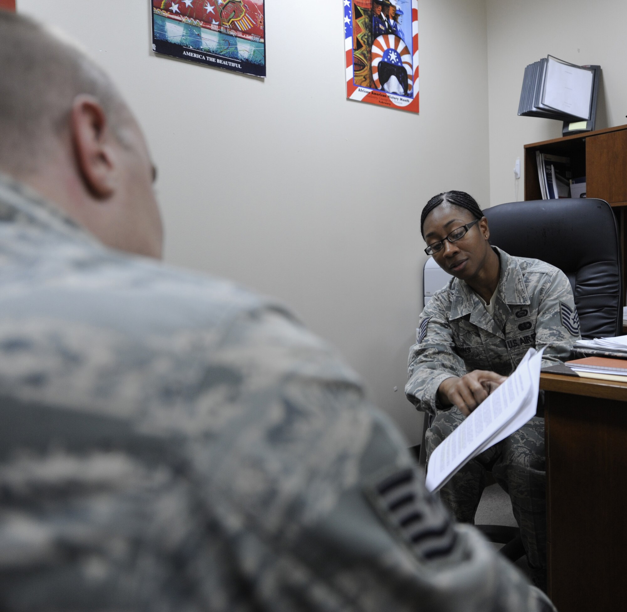 SOUTHWEST ASIA – Tech. Sgt. Eumiko Egins, 386th Air Expeditionary Wing regional equal opportunity director, talks to an individual here Aug. 21. The Equal Opportunity team ensures discrimination and harassment free work environment for all Air Force personnel assigned to the 386th AEW and ensure all Department of Defense personnel and coalition forces are provided a full and fair opportunity to contribute to the fullest extent to their ability in pursuing a career in their chosen profession. (U.S. Air Force photo/Staff Sgt. Alexandra M. Boutte) 