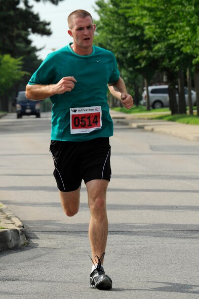 Staff Sgt. Zachary Davis 8th Maintenance Squadron, competes in a triathlon at Kunsan Air Base, Republic of Korea, Aug. 25. Davis took 3rd place in the men age 20 bracket with a time of 1:15:29. (U.S. Air Force photo/Senior Airman Marcus Morris)