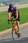 Tech. Sgt. Kevin Greenwich, 8th Aircraft Maintenance Squadron, competes in a triathlon at Kunsan Air Base, Republic of Korea, Aug. 25. Greenwich took first place for the men age 30 bracket with a time of 1:28:06. (U.S. Air Force photo/Senior Airman Marcus Morris)