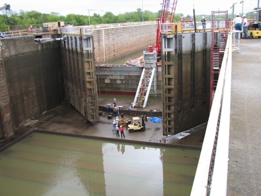 Corps of Engineers personnel performing inspections and repairs during the dewater of lock 17.