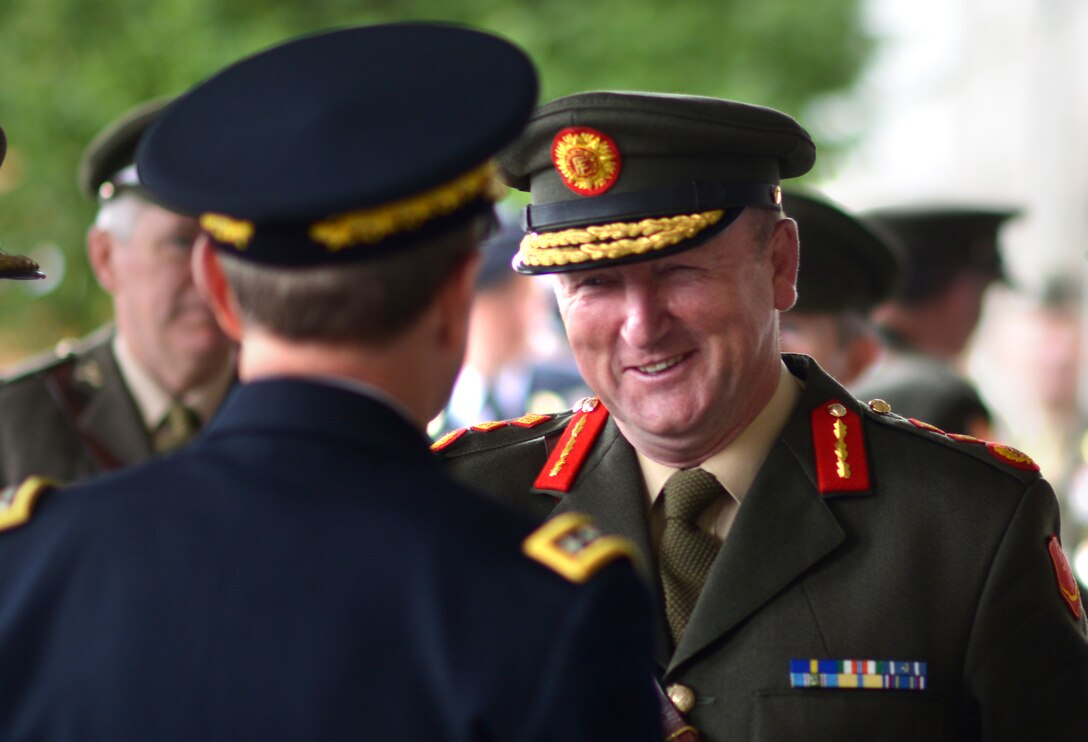 U.S. Army Gen. Martin E. Dempsey, chairman of the Joint Chiefs of Staff, talks with Irish Lt Gen. Sean McCann, chief of staff for Ireland's Defense Forces, at Brugha Barracks in Dublin, Aug. 31, 2012.