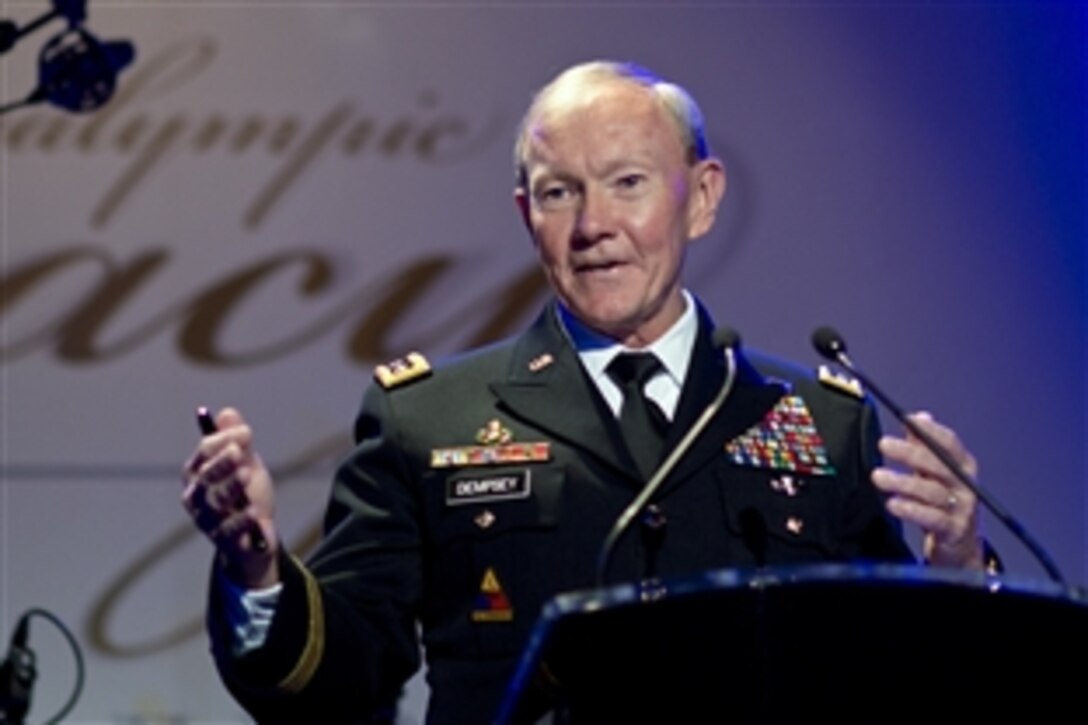 Army Gen. Martin E. Dempsey, chairman of the Joint Chiefs of Staff, addresses the U.S. Paralympics Committee and several of its sponsors in London, Aug. 30, 2012. Dempsey honored the legacy of the games and expressed his gratitude to the supporters of wounded warriors and disabled veterans.
