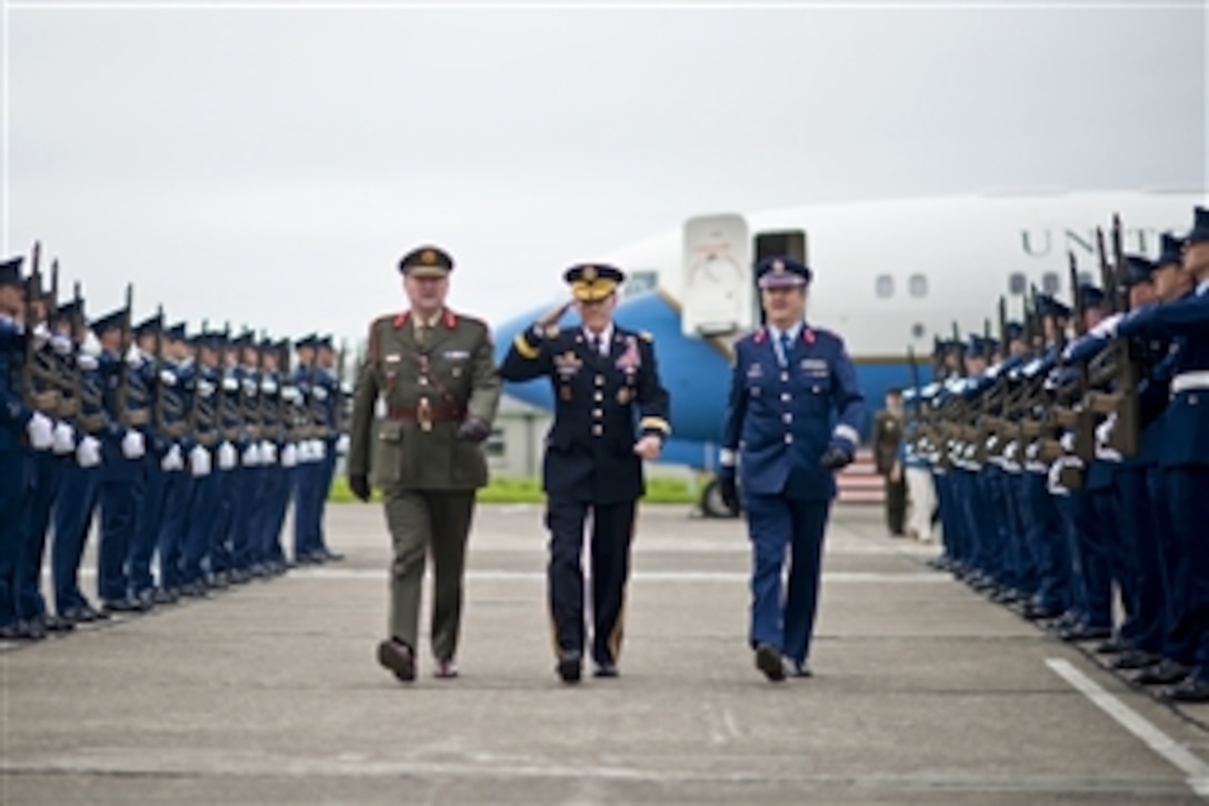 U.S. Army Gen. Martin E. Dempsey, chairman of the Joint Chiefs of Staff, salutes upon his arrival in Dublin, Ireland's capital, Aug. 31, 2012.