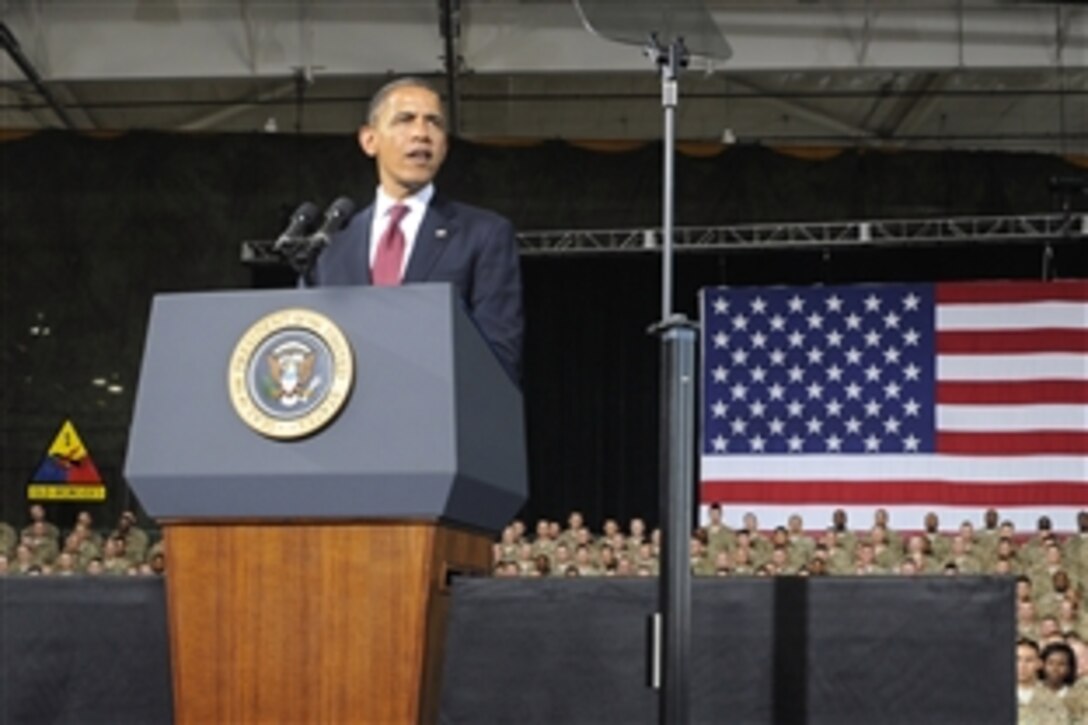President Barack Obama talks to soldiers about the future of the Army and the United States during a visit to Fort Bliss, Texas, Aug. 31, 2012. The soldiers are assigned to the 1st Armored Division.