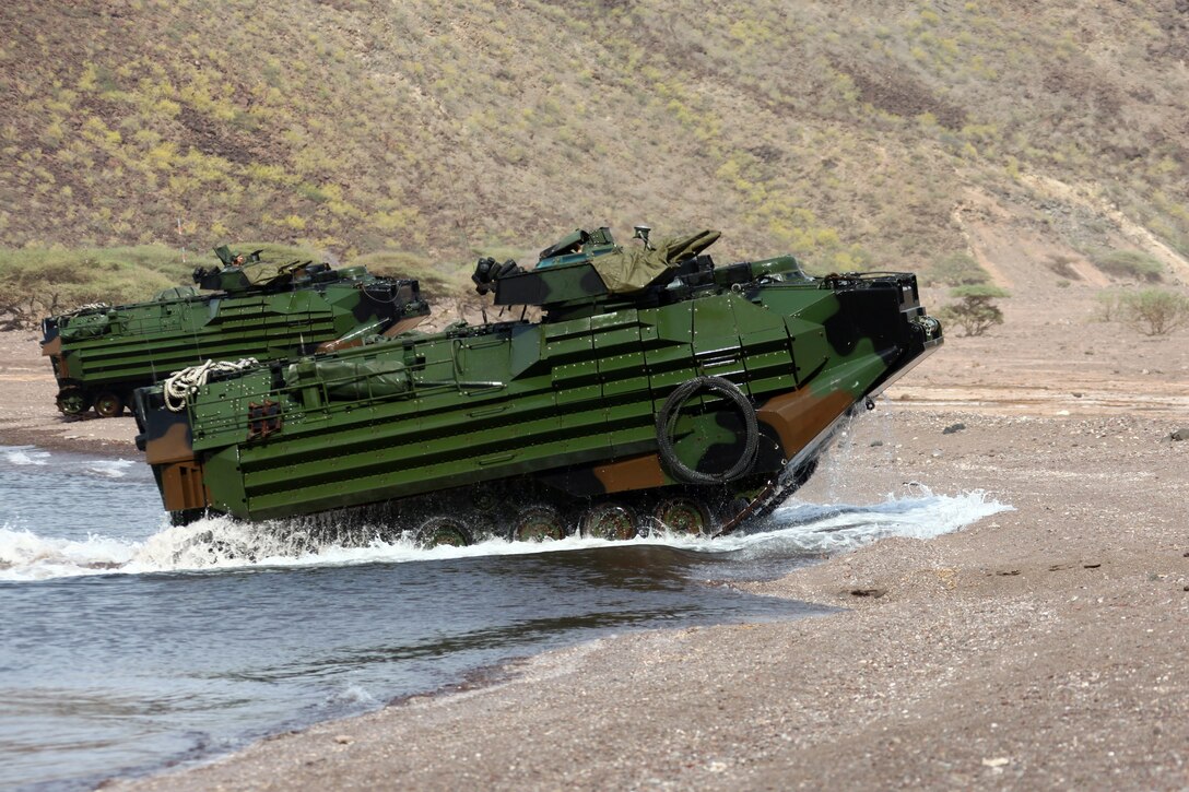 Assault Amphibious Vehicles carry Marines with Alpha Company, Battalion Landing Team 1st Battalion, 2nd Marine Regiment, 24th Marine Expeditionary Unit, to their objective during an amphibious training raid in Djibouti, Aug. 15, 2012. Alpha Company came ashore from the USS New York, which loitered off the coast of Djibouti in support of 24th MEU amphibious operations. Elements of the 24th MEU are operating in and around Djibouti, taking part in and coordinating various unilateral exercises and bilateral events with foreign militaries. The 24th MEU is deployed with the Iwo Jima Amphibious Ready Group as a theater reserve and crisis response force in support of U.S. Central Command and the U.S. Navy's 5th Fleet area of responsibility.