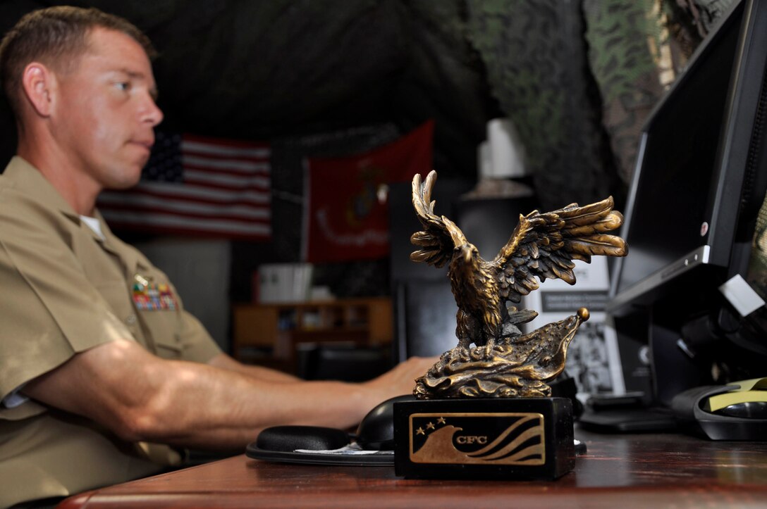 Maj. Stephen F. Wildt, the Combined Federal Campaign action officer for Marine Corps Base Camp Pendleton, completes work at his desk in preparation for this year's charity campaign. The CFC, established in 1961 by Pres. John F. Kennedy, is an annual workplace charity campaign that provides federal and military employees with an opportunity to donate to local, national and international organizations.