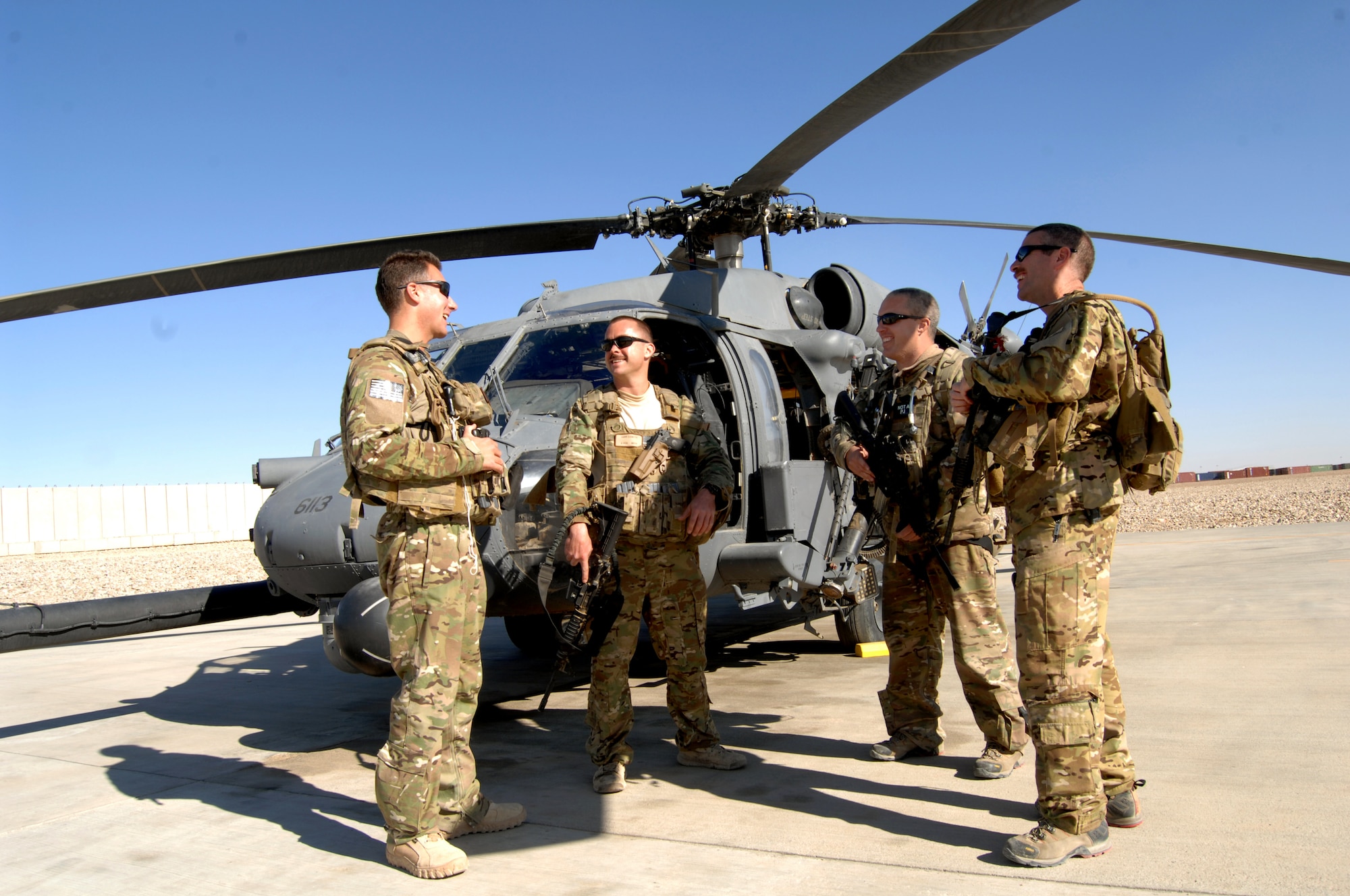 (From left) U.S. Air Force Capt. Shaun Cullen, Capt. Tripp Zanetis, Tech. Sgt. Jim Denniston and Tech. Sgt. Erick Pound are all members of the 101st Rescue Squadron, New York Air National Guard, currently assigned to the 26th Expeditionary Rescue Squadron, take turns “busting each other’s chops,” following shift-change at Camp Bastion, Afghanistan Nov. 29. They are all firefighters when not activated. Cullen, the aircraft commander, is assigned to Engine 54, in Midtown Manhattan; Zanetis, the copilot, is assigned to Ladder 11 in Lower East Manhattan; Pound, the aerial gunner, is assigned to Engine 58 in Harlem; and Denniston, the flight engineer, is assigned to Engine 285 in Queens. Together at the 26th ERQS, the team makes-up Pedro 24, a quick-response HH-60 Pave Hawk medical evacuation crew. (U.S. Air Force photo/Master Sgt. Russell Martin)