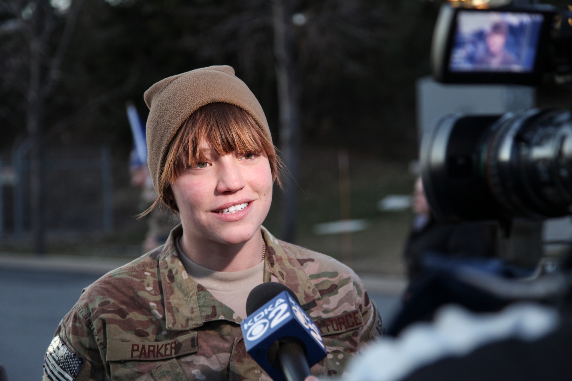 Airman 1st Class Lanie M. Parker, attached to the 911th Civil Engineering Squadron, expresses her happiness to a KDKA news reporter after her return home from a 7 month deployment in support of Operation Enduring Freedom, Feb. 20, 2012. Parker also recognized her fellow Airmen for their hard work and continuous dedication to their mission, which enabled them to provide construction support throughout the Combined Joint Operations Area in Afghanistan. (U.S. Air Force photo by Tech. Sgt. Ralph Van Houtem/Released)