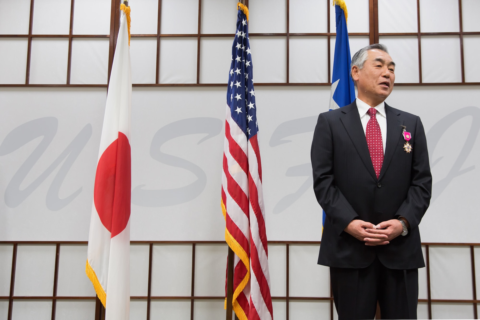 YOKOTA AIR BASE, Japan -- Retired Japan Self Defense Forces Gen. Ryoichi Oriki, former Chief of Staff, Joint Staff, JSDF, delivers a speech after he was awarded the Legion of Merit medal at Yokota Air Base, Japan, Nov. 30, 2012. "It is a medal for the concentrated efforts of the Self Defense Forces members," Oriki said of the award. (U.S. Air Force photo by Osakabe Yasuo) 