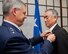 YOKOTA AIR BASE, Japan -- Retired Gen. Ryoichi Oriki, former Chief of Staff of the Joint Staff, Japan Self-Defense Forces, receives a The Legion of Merit medal pinned by U.S. Air Force Lt. Gen. Sam Angelella, U.S. Forces Japan and 5th Air Force commander, at Yokota Air Base, Nov. 30, 2012. Oriki received the award for meritorious conduct, performance and achievement during bilateral disaster relief operations at the aftermath of the Great East Japan Earthquake last year. Oriki retired in January 2012. The Legion of Merit was established by Congress on July 20, 1942; by President Franklin D. Roosevelt. The Legion of Merit is also awarded to members of armed forces of friendly foreign nations who have distinguished themselves by exceptionally meritorious conduct in the performance of outstanding service. (U.S. Air Force photo by Osakabe Yasuo)