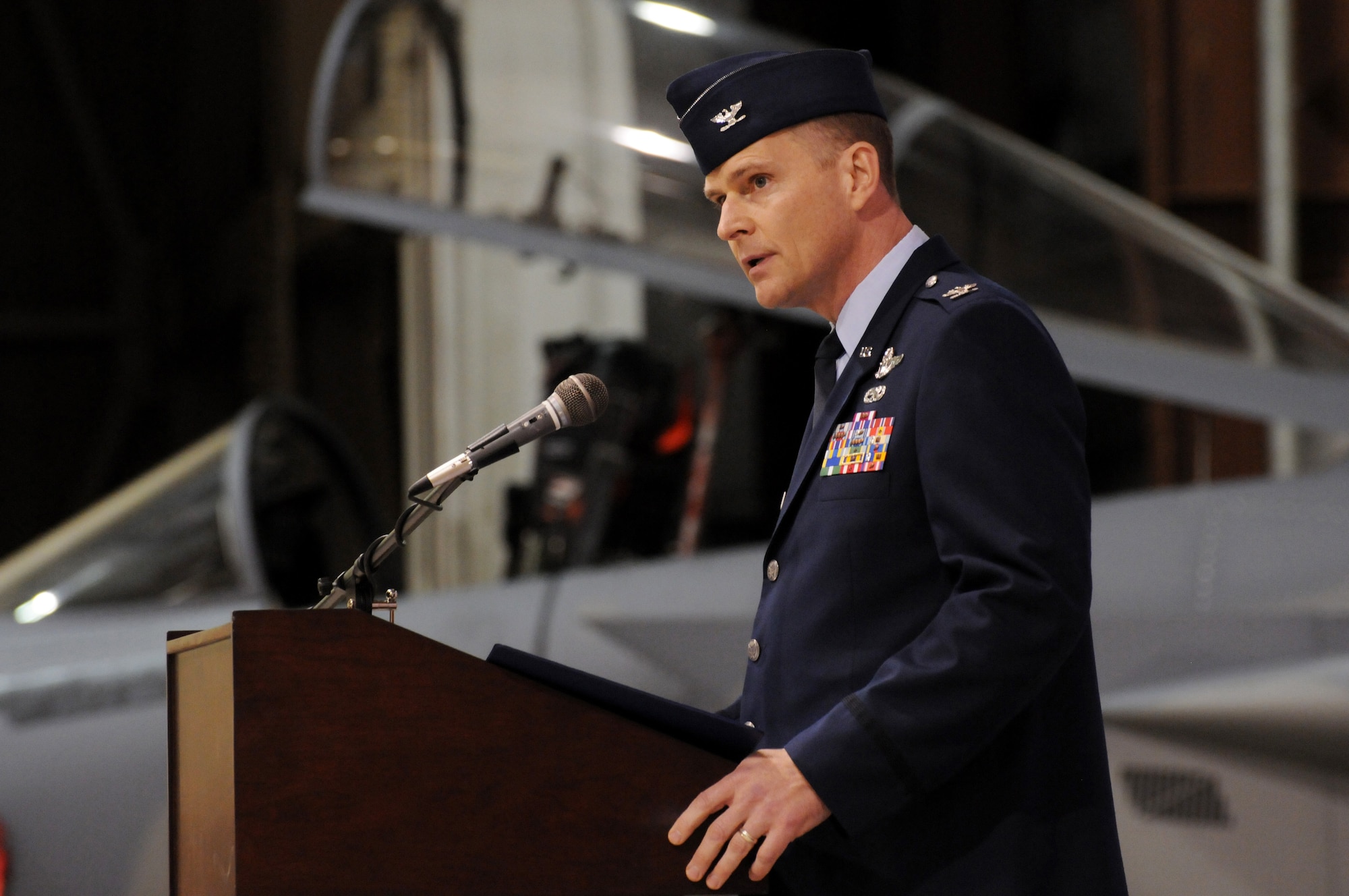 Oregon Air National Guard Col. Richard Wedan addresses attendees at the 142nd Fighter Wing Change of Command ceremony, held at the Portland Air National Guard Base in Portland, Ore., Dec. 2. Wedan assumes command from Col. Michael E. Stencel, who had commanded the Wing for the past three years. (U.S. Air Force photo by Tech. Sgt. John Hughel, 142nd Fighter Wing Public Affairs / released.)