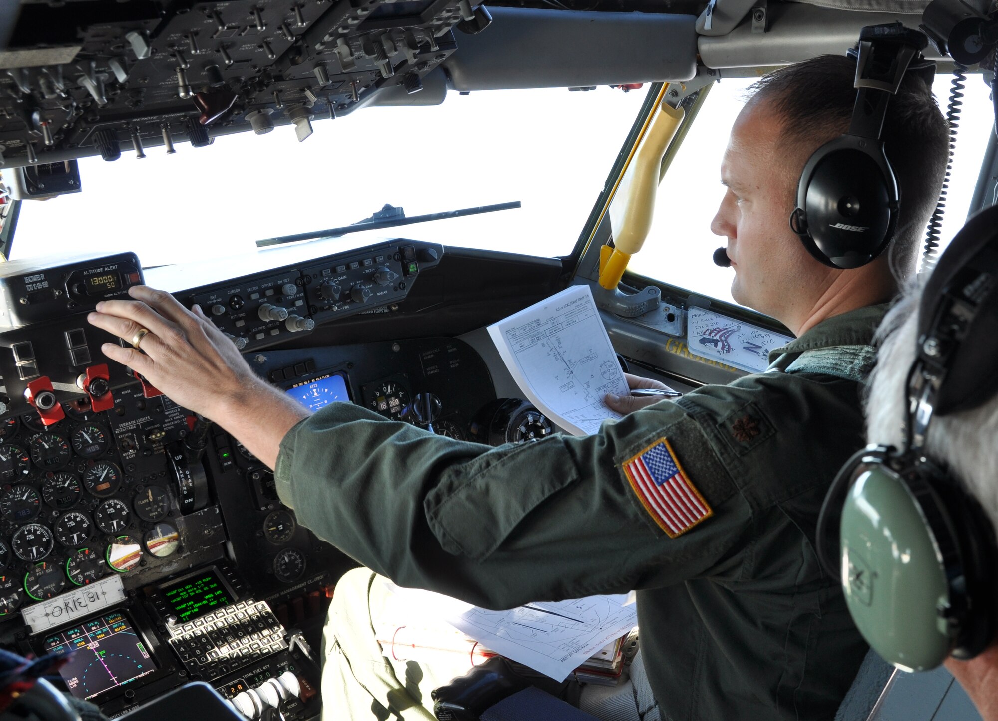 Maj. Ben Yoder, 465th Air Refueling Squadron KC-135 Aircraft Commander prepares for a landing near Wright-Paterson Air Force Base, Ohio on November 29.  On the sortie the crew conducted over 45 minutes of refueling training with a C-17 Globemaster from the 172nd Airlift Wing out of Jacksonville, Mississippi. (Photo by Capt. Jon Quinlan)