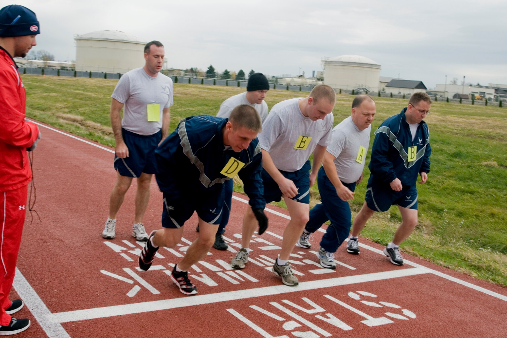 GRISSOM AIR RESERVE BASE, Ind. -- 434th Air Refueling Wing Airmen take their mark as they prepare to start a cardio portion of their physical fitness test on Grissom's new running track here Nov. 3. The rubberized track was recently opened, and is located directly across the base fitness center off of Doc Evans Avenue. (U.S. Air Force photo/Senior Airman Jami K. Lancette)