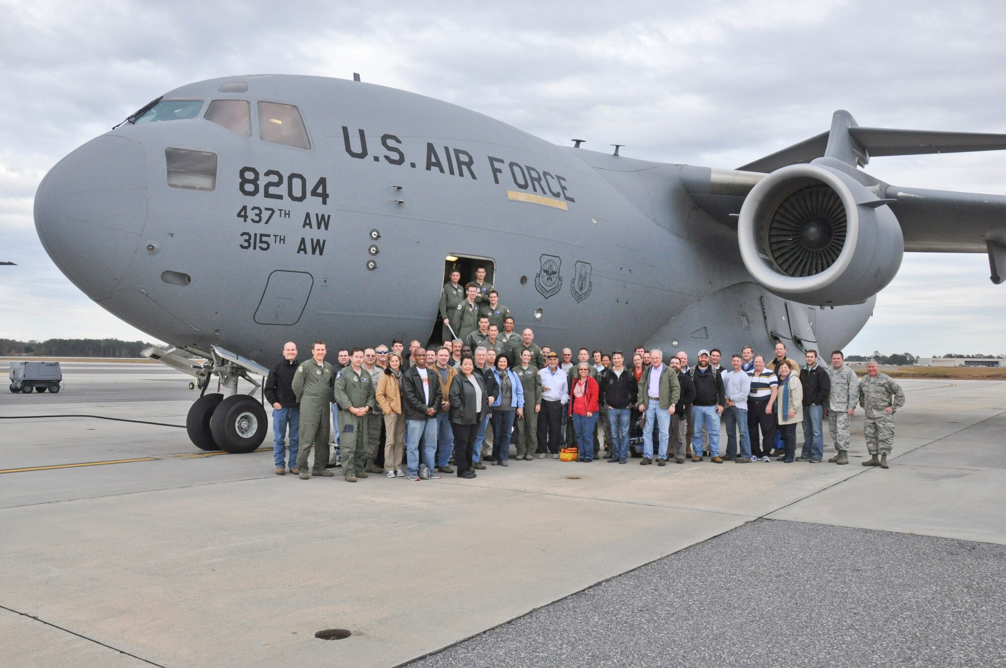 Community employers/leaders from the Charleston, S.C., area pose for a photo in front of a C-17 Globemaster III on the ramp at the Joint Base Charleston, S.C., airfield Dec. 1, 2012. The leaders took part in the 315th Airlift Wing's employer/civic leader tour flight, which is designed to orient employers with the mission of the Air Force Reserve. (U.S. Air Force photo by 1st Lt. Jeff Kelly)