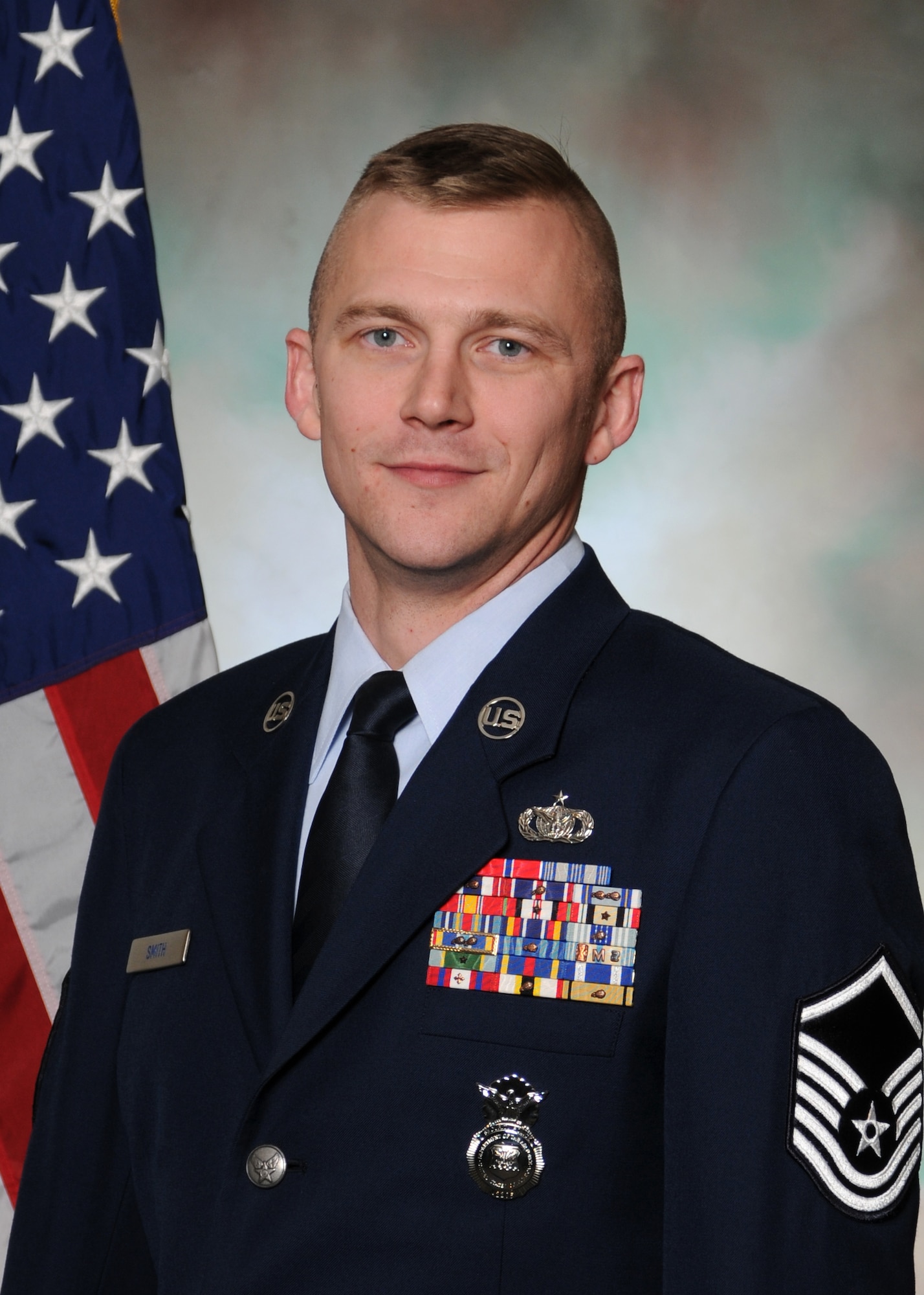 Master Sgt. Olen Smith, 175th Security Forces Squadron, was named the 2013 Maryland Air National Guard Outstanding Senior non-commissioned officer of the Year during the annual Airman Recognition ceremony. The ceremony was held at Warfield Air National Guard Base, Baltimore, Md. December 2, 2012. (National Guard Photo by Staff Sgt. Benjamin Hughes/Released)
