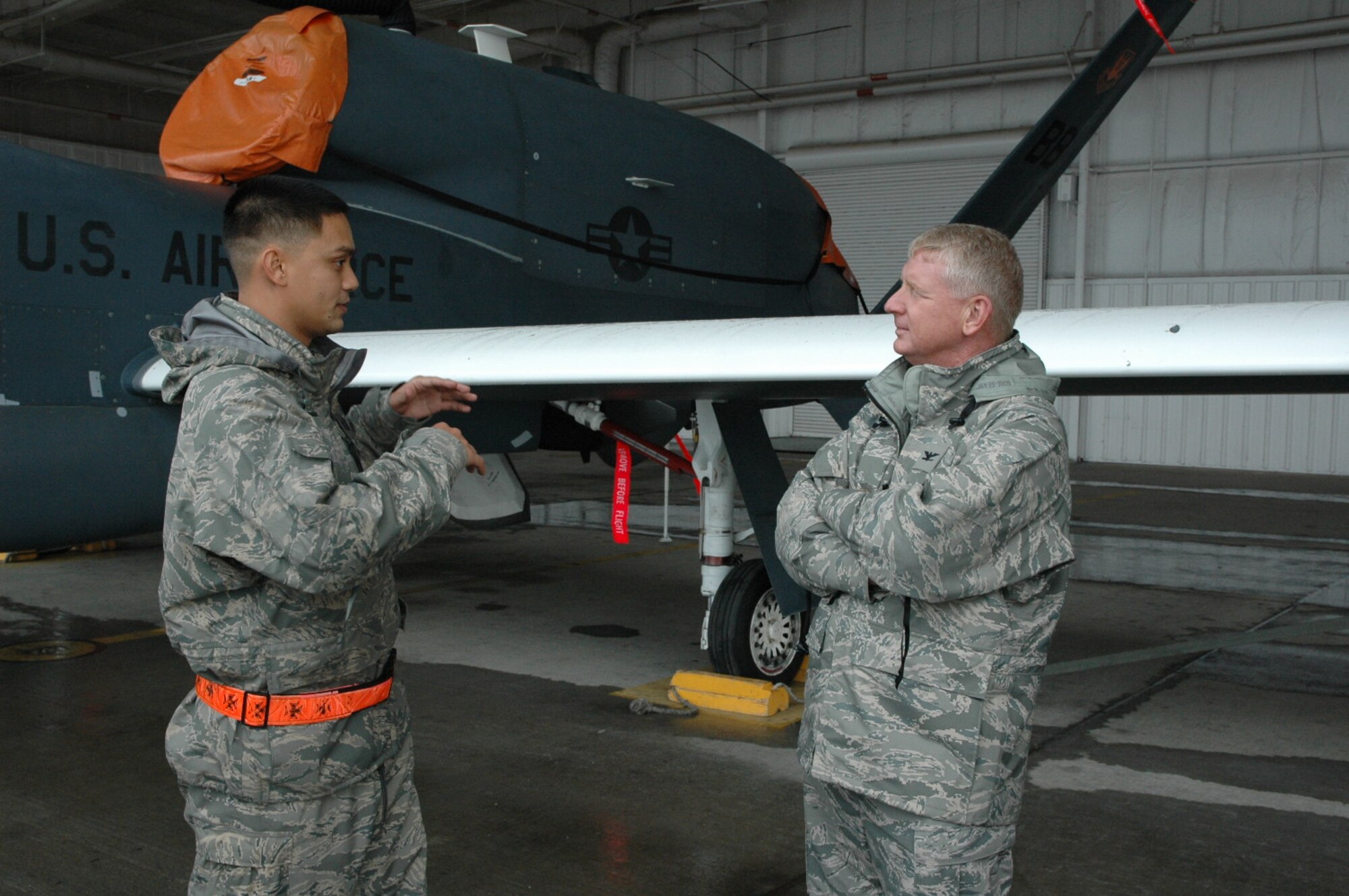 Tech Sgt Jeremy Bustos briefs Col >>>> during his visit to Beale AFB Dec 1