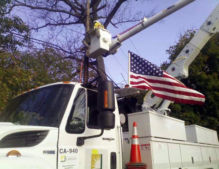 Southern California Edison deployed to the East Coast in support of Super-Storm Sandy restoration efforts during the first week of November 2012. For several weeks, SCE utility vehicles traveled throughout the disaster areas, repairing downed power lines and restoring electricity. (U.S. Air Force photo by Chief Master Sgt. Jim Wood)