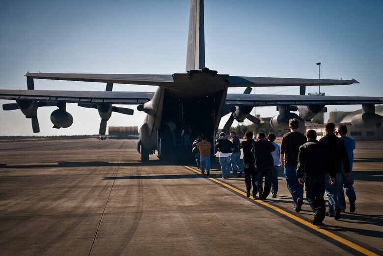 More than 20 employers of 919th Special Operations Wing reservists climb aboard a MC-130E Combat Talon I during an employer-day tour at Duke Field, Fla. Dec. 1.  The employers attended the tour for a better understanding of how their workers contribute to the Air Force and special operations mission.  (U.S. Air Force photo/Tech. Sgt. Samuel King Jr.)