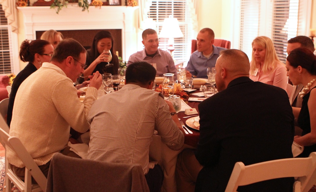 Marines and sailors enjoy their pumpkin soup during the II Marine Expeditionary Force Heroes Dinner aboard Marine Corps Base Camp Lejeune, Nov. 14. Nine service members were recognized for their courage and selflessness.