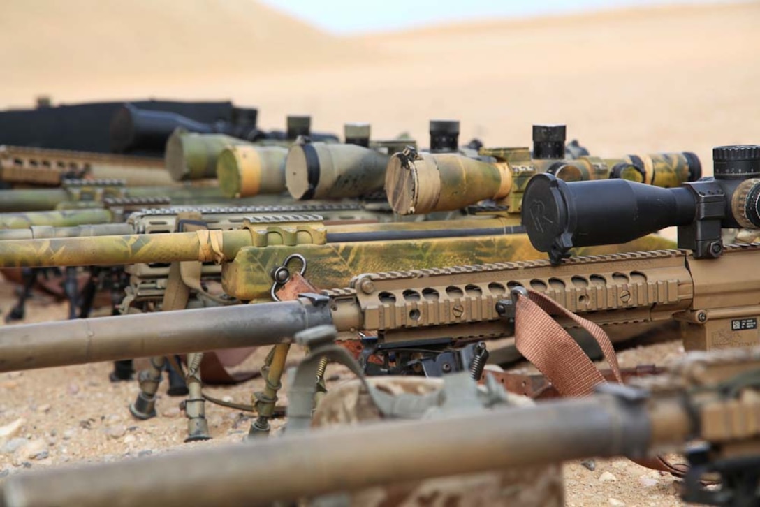Sniper rifles from Scout Sniper Platoon, Weapons Company, Battalion Landing Team 3/5, 15th Marine Expeditionary Unit were staged at a firing range near Camp Buehring during Exercise Eager Mace 13, Nov. 12, in order to conduct live fire exercises with members of the Kuwait Armed Forces. The U.S. Navy and Marine Corps participated in the bilateral training exercise with the Kuwait Armed Forces Nov. 11-21.  The purpose of the exercise was to expand levels of cooperation, enhance mutual maritime capabilities, as well as promote long-term regional stability and interoperability between U.S. forces and regional partners. The 15th MEU is deployed as part of the Peleliu Amphibious Ready Group as a theater reserve and crisis response force throughout U.S. Central Command and the U.S. 5th Fleet area of responsibility.  (U.S. Marine Corps photo by Cpl. Timothy Childers/Released)