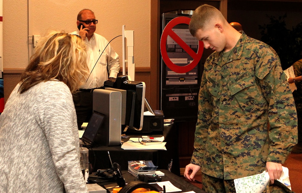 1st Lt. Timothy Richardson, communications officer, Combat Logistics Battalion 7 talks to vendors at the Tech Expo at the Combat Center’s Officer’s Club Nov. 15.