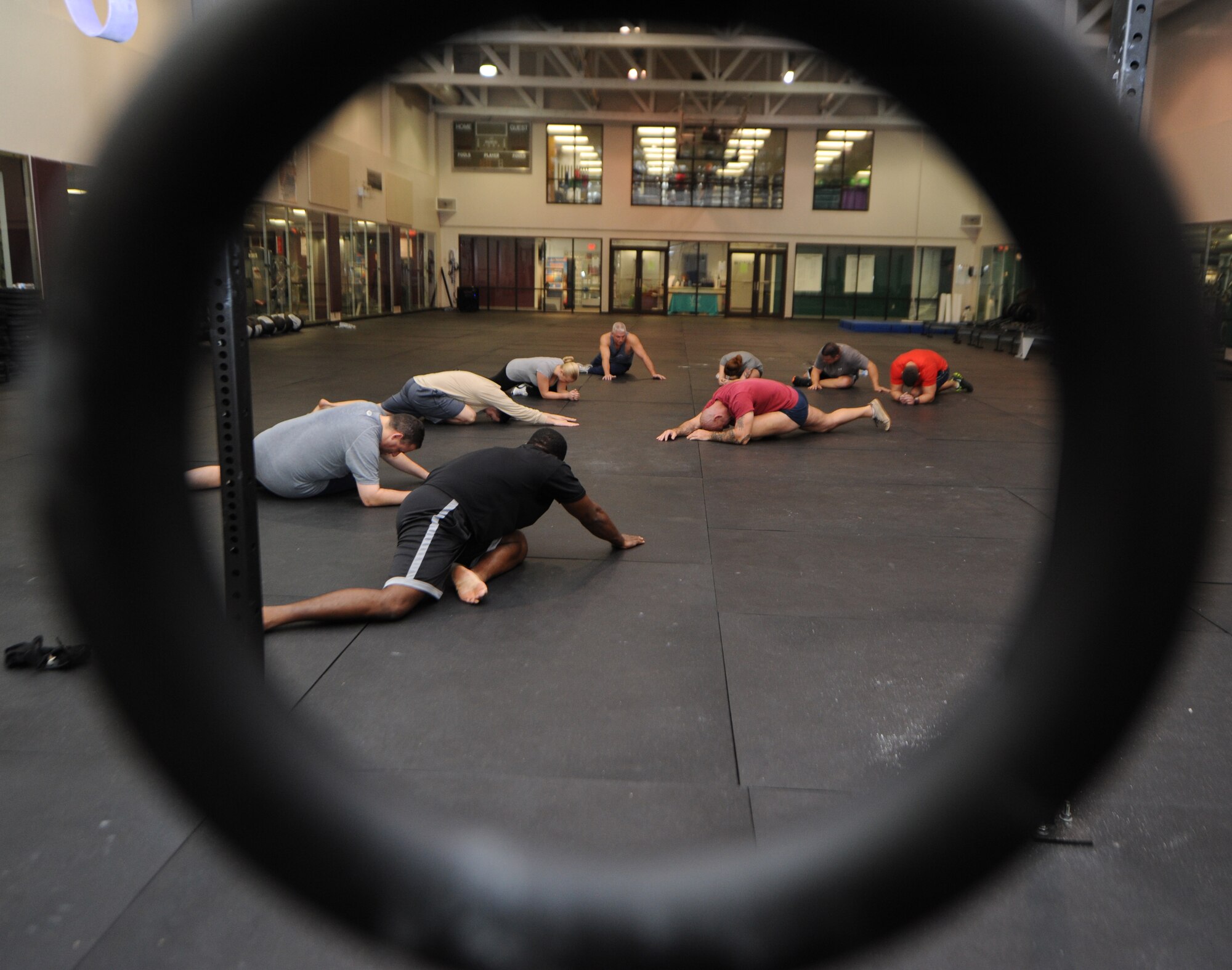 Al Ciampa, 81st Aerospace Medicine Squadron exercise physiologist, conducts a human performance course for physical training leaders Nov. 30, 2012 at the Dragon Fitness Center, Keesler Air Force Base, Miss. The human performance course is designed to teach physical training leaders proper movement to facilitate greater body mobility and stability, employing a whole-body approach to strength conditioning.  (U.S. Air Force photo by Kemberly Groue)