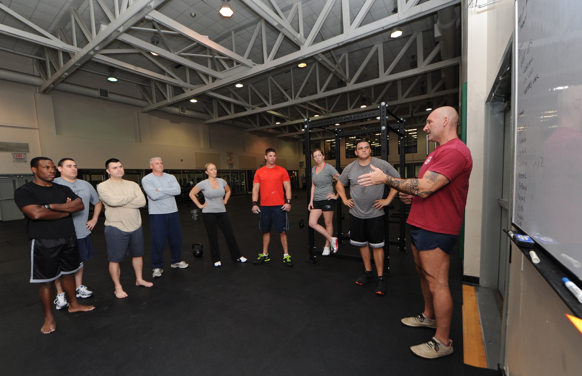 Al Ciampa, 81st Aerospace Medicine Squadron exercise physiologist, conducts a human performance course for physical training leaders Nov. 30, 2012 at the Dragon Fitness Center, Keesler Air Force Base, Miss. The human performance course is designed to teach physical training leaders proper movement to facilitate greater body mobility and stability, employing a whole-body approach to strength conditioning.  (U.S. Air Force photo by Kemberly Groue)