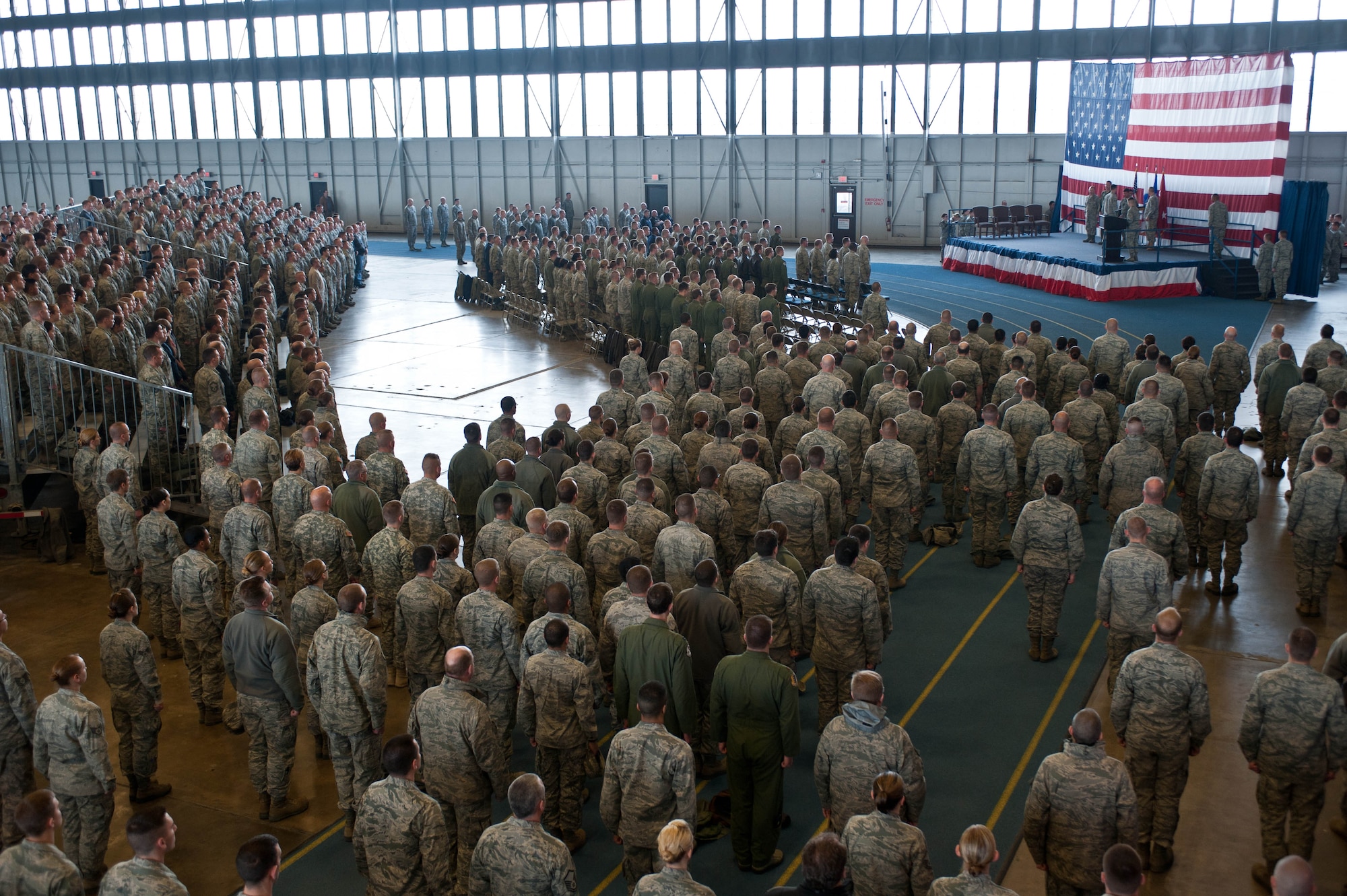 Airmen attend an all call event held in the Pride Hangar at Ellsworth Air Force Base, S.D., Nov. 28, 2012. Ellsworth Airmen receive decorations from Maj. Gen. Gregory Lusk, North Carolina National Guard adjutant general-air, Brig. Gen. Todd Kelly, North Carolina National Guard assistant adjutant general-air, and Col. Roger Williams, 145th Airlift Wing commander North Carolina Air National Guard, for their efforts during the C-130 crash response that occurred in southwestern South Dakota during July 2012. (U.S. Air Force photo by Airman 1st Class Zachary Hada/Released)