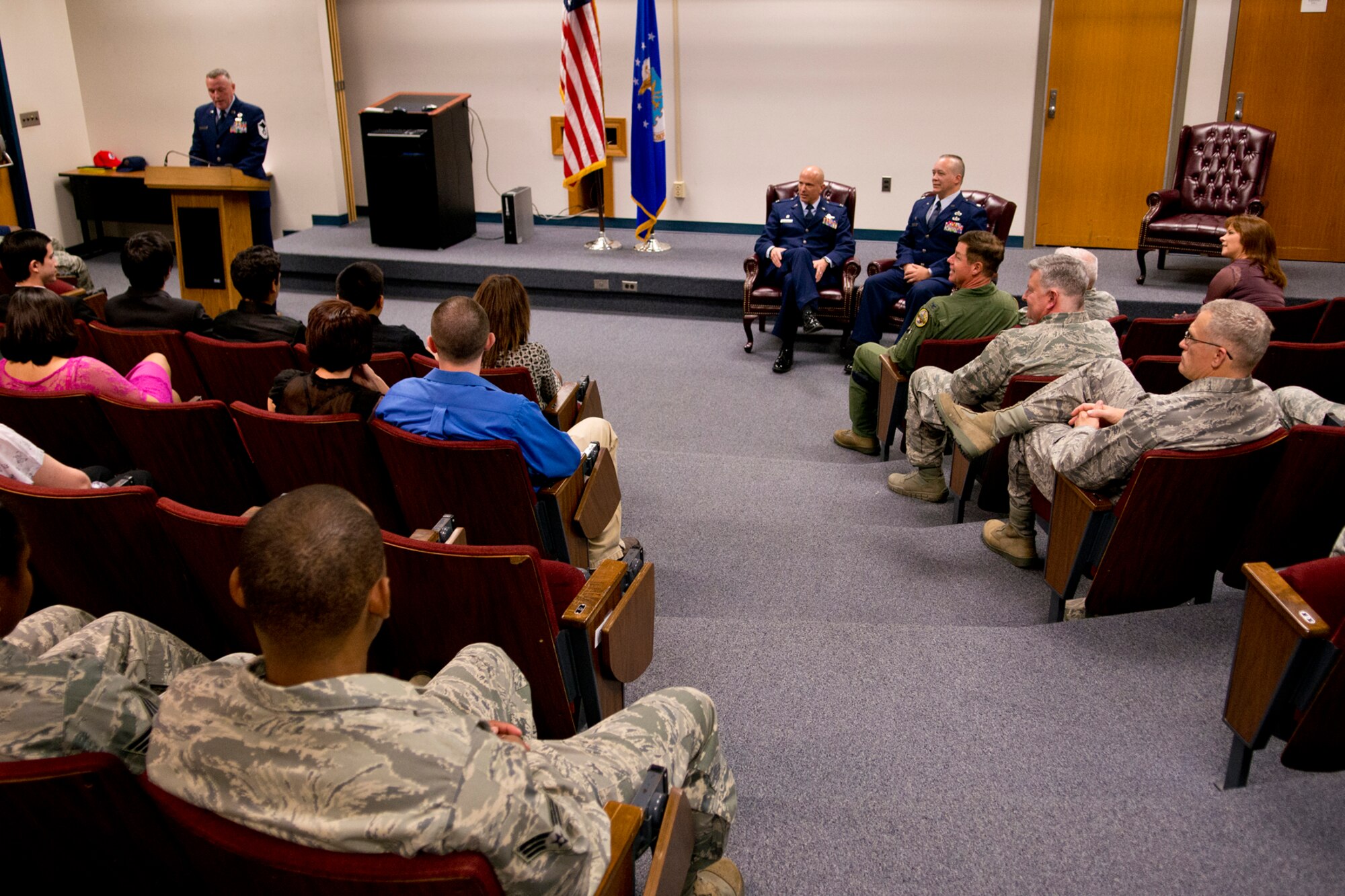Family, friends and coworkers attend a Pinning On ceremony for U.S. Air Force Col. Jeffery Barnett, Dec. 1, 2012, Barksdale Air Force Base, La. Barnett, seated on the right, is the commander of the 307th Rapid Engineer Deployable Heavy Operational Repair Squadron. (U.S. Air Force photo by Master Sgt. Greg Steele/Released)