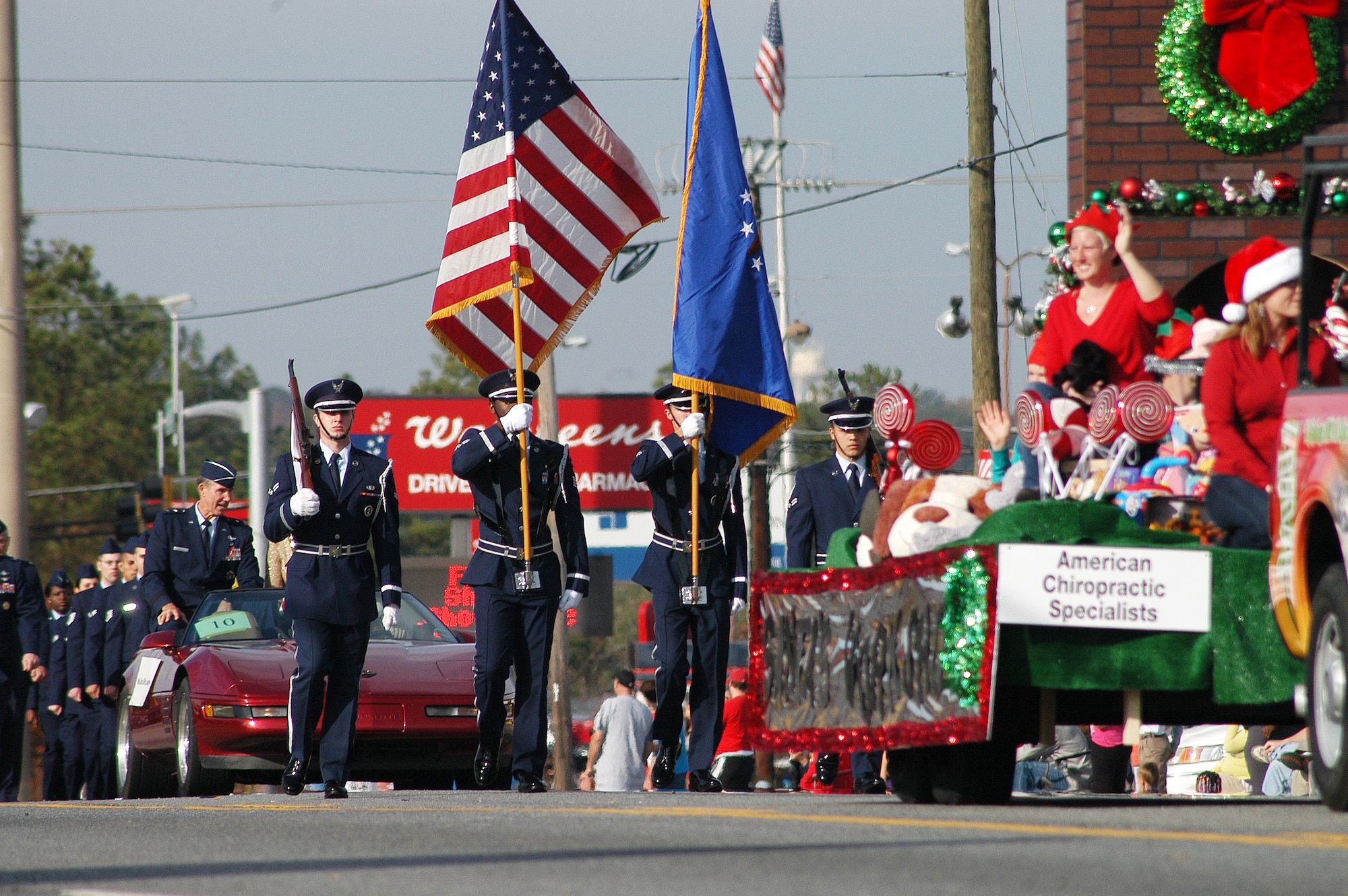 The Robins Honor Guard march in the 2012 Warner Robins Christmas Parade Saturday.  (U. S. Air Force photo/Sue Sapp)
