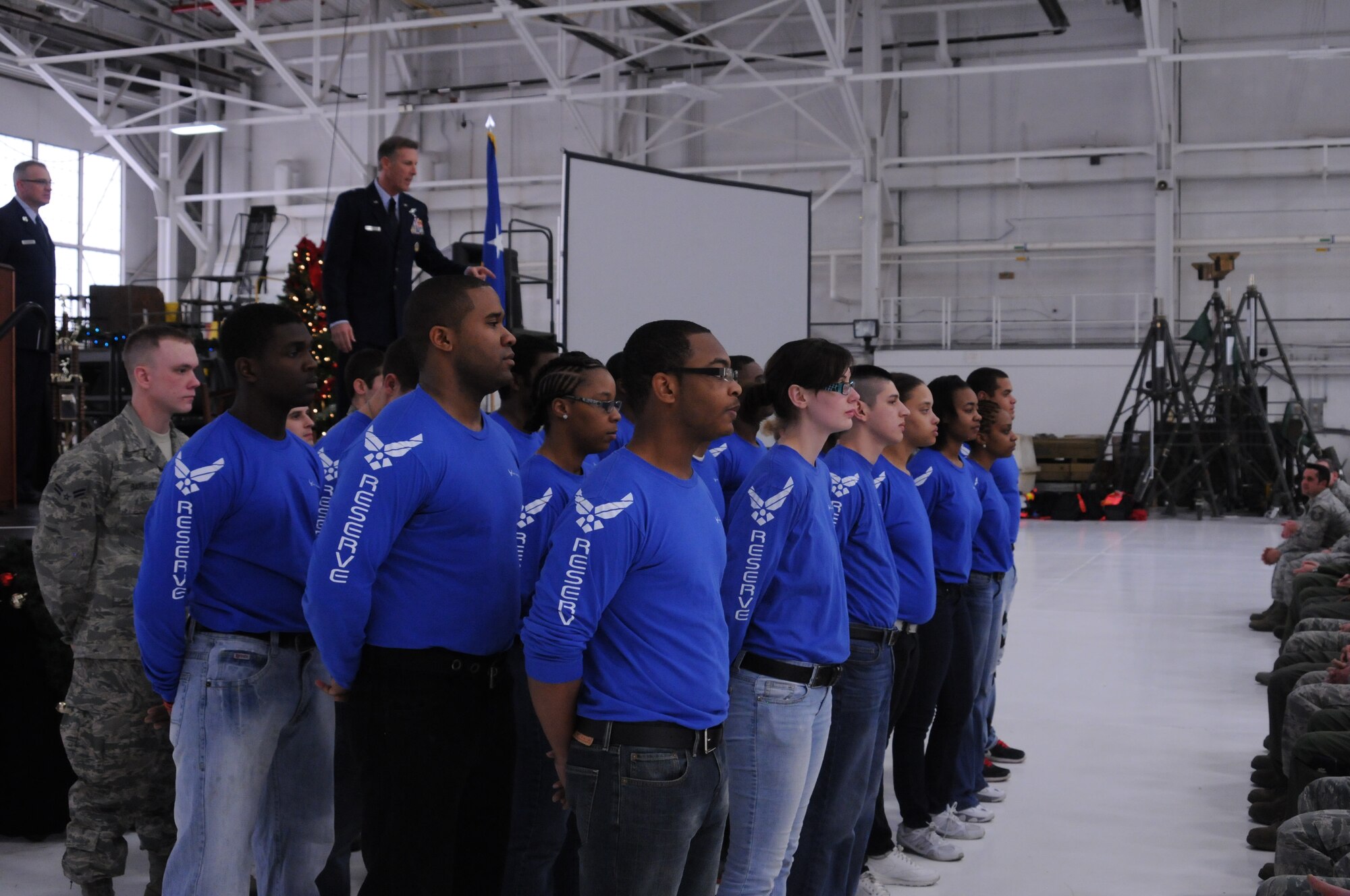 YOUNGSTOWN AIR RESERVE STATION, Ohio – Members of the 910th Airlift Wing Development and Training Flight are commended for their efforts in front of the entire wing Dec. 1, 2012 at Youngstown Air Reserve Station, Ohio. The trainees were responsible for helping with the set-up of the annual holiday Commander’s Call. (U.S. Air Force photo by Senior Airman Ron Dombkowski) 
