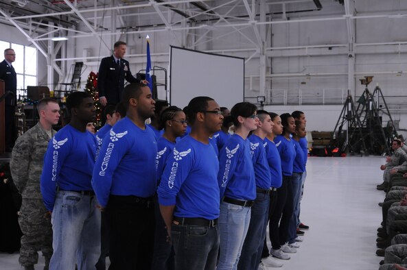 YOUNGSTOWN AIR RESERVE STATION, Ohio – Members of the 910th Airlift Wing Development and Training Flight are commended for their efforts in front of the entire wing Dec. 1, 2012 at Youngstown Air Reserve Station, Ohio. The trainees were responsible for helping with the set-up of the annual holiday Commander’s Call. (U.S. Air Force photo by Senior Airman Ron Dombkowski) 