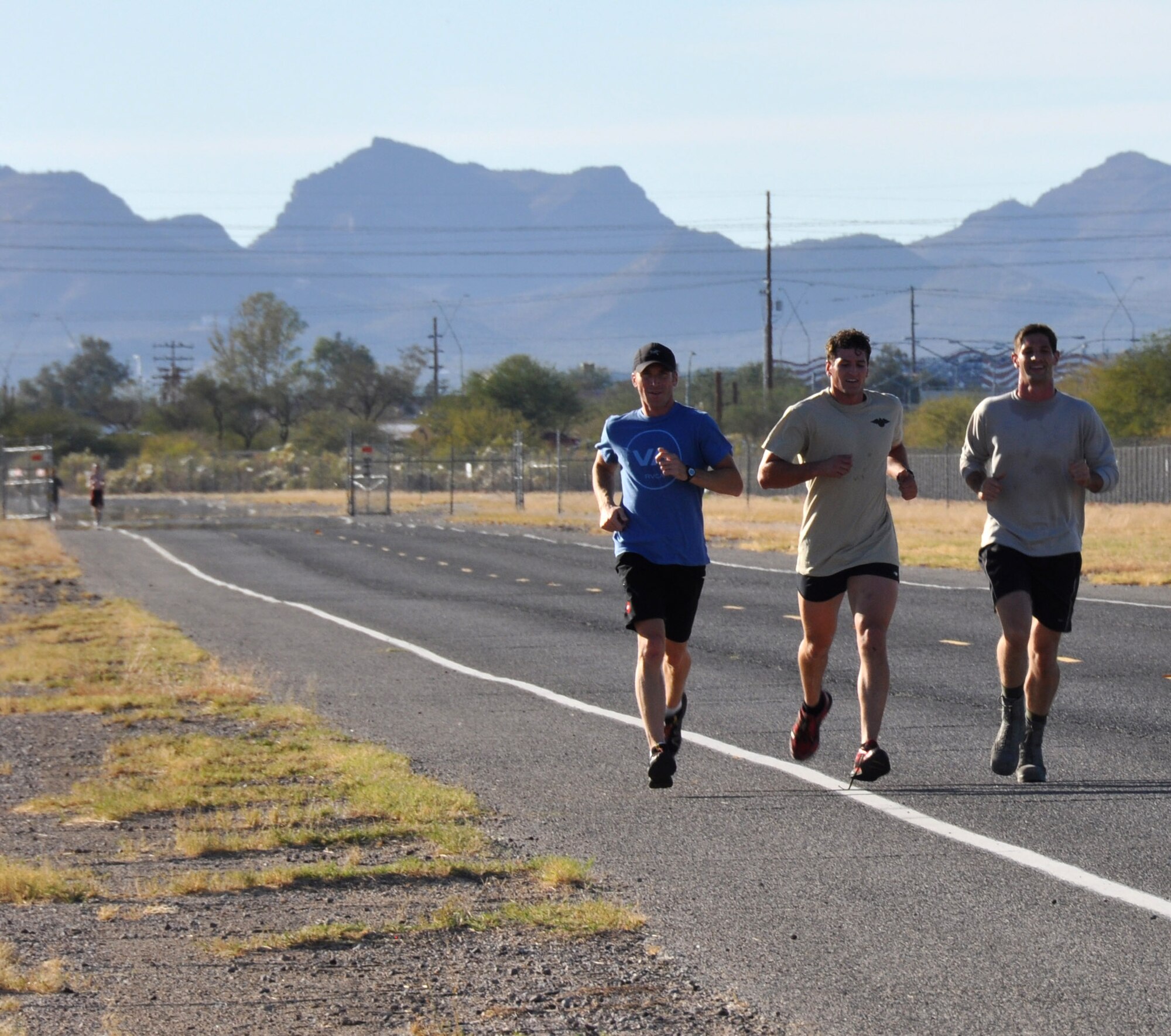 Maj. Jesse Peterson, Senior Airman Jason Sweet and Airman 1st Class Jordan Backus participate in the first ever 943rd Rescue Group Holiday Fun Run, December 2. The 943rd RQG Top Three organized the fun run and the top runner’s received free t-shirts for their efforts. (U.S. Air Force Photo/ Staff Sgt. Sarah Pullen)