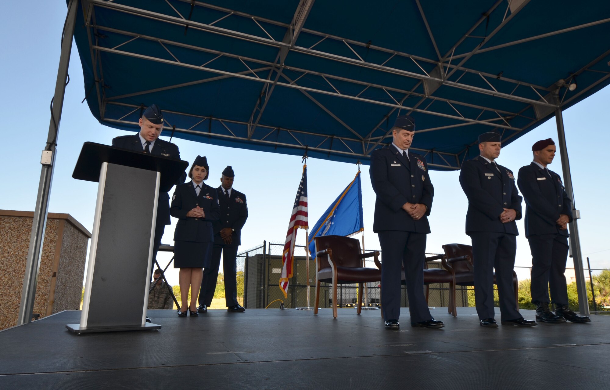 Chaplain (Maj.) Matthew Simpson, 920th Rescue Wing reserve chaplain, gives the invocation before the change of command ceremony for the 308th Rescue Squadron. Maj. John Fish assumed command from Lt. Col. Kurt Matthews Sunday during the 920th RQW's Unit Training Assembly. (U.S. Air Force photo/2nd Lt. Leslie Forshaw)