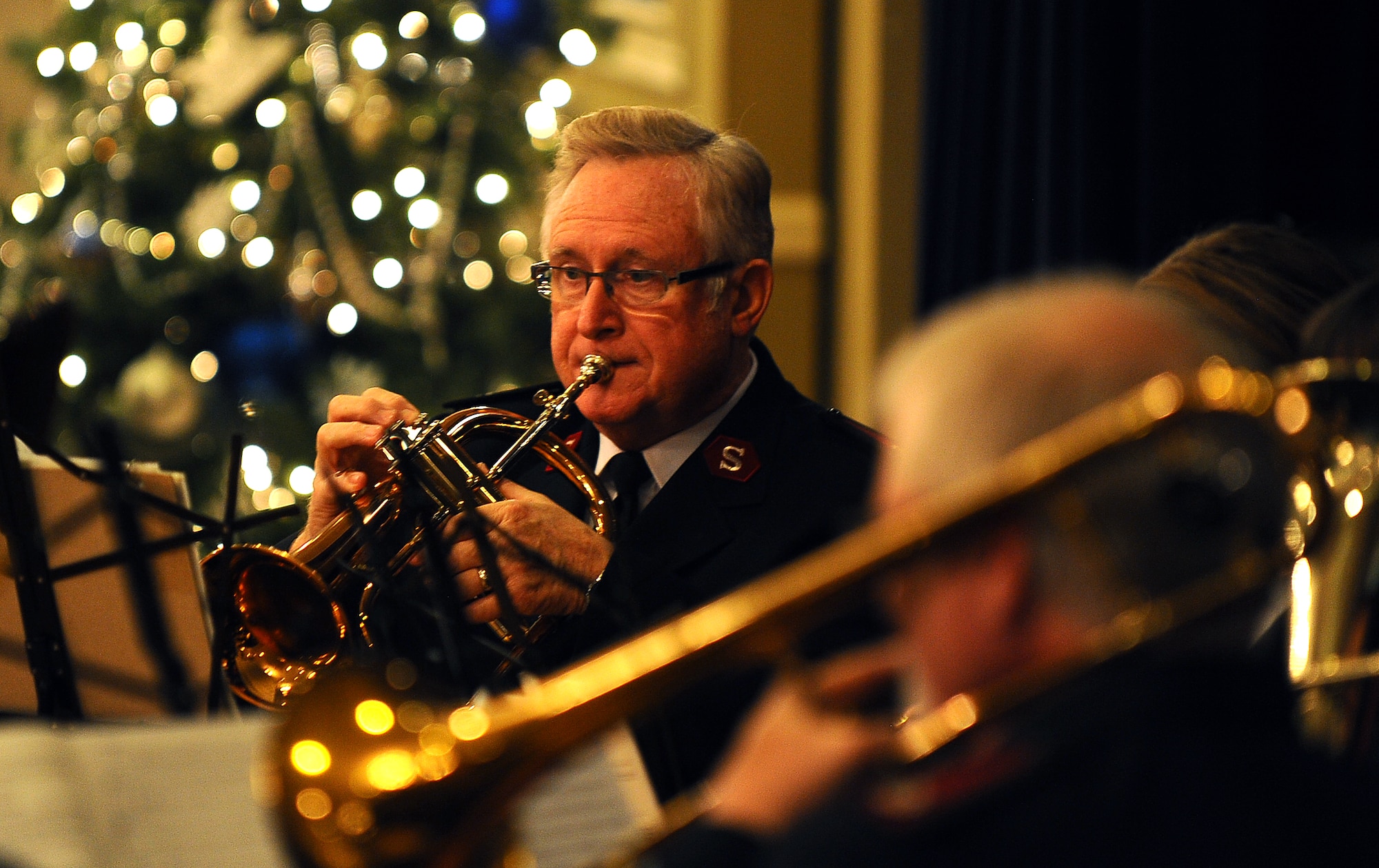 The Salvation Army’s Brass Ensemble made an appearance for the annual Christmas Tree Lighting Ceremony held at the Strategic Air Command Chapel as well as the Patriot Club on Offutt Air Force Base, Neb., Nov. 29. The tree lighting ceremony and the festivities that follow draws hundreds of families. (U.S. Air Force Photo by Josh Plueger/Released)