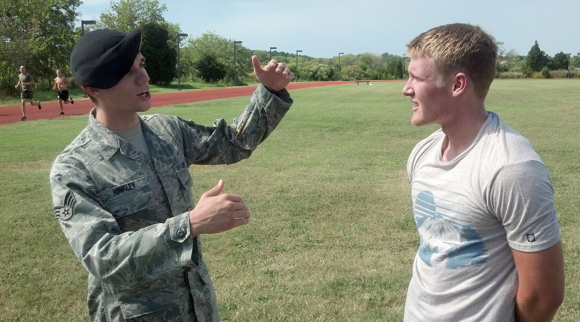 A U.S. Air Force Tactical Air Control Party Airman mentors an applicant in 2011 at Joint Base Langley-Eustis, Va. Evaluation teams will be screening applicants for openings on elite pararescue, combat control, TACP and survival instructor teams.  At the same time, candidates will get to hear inspiring stories first-hand from Special Operations Forces warriors, try on their equipment, and learn about the technologies they wield. (Courtesy photo)  
