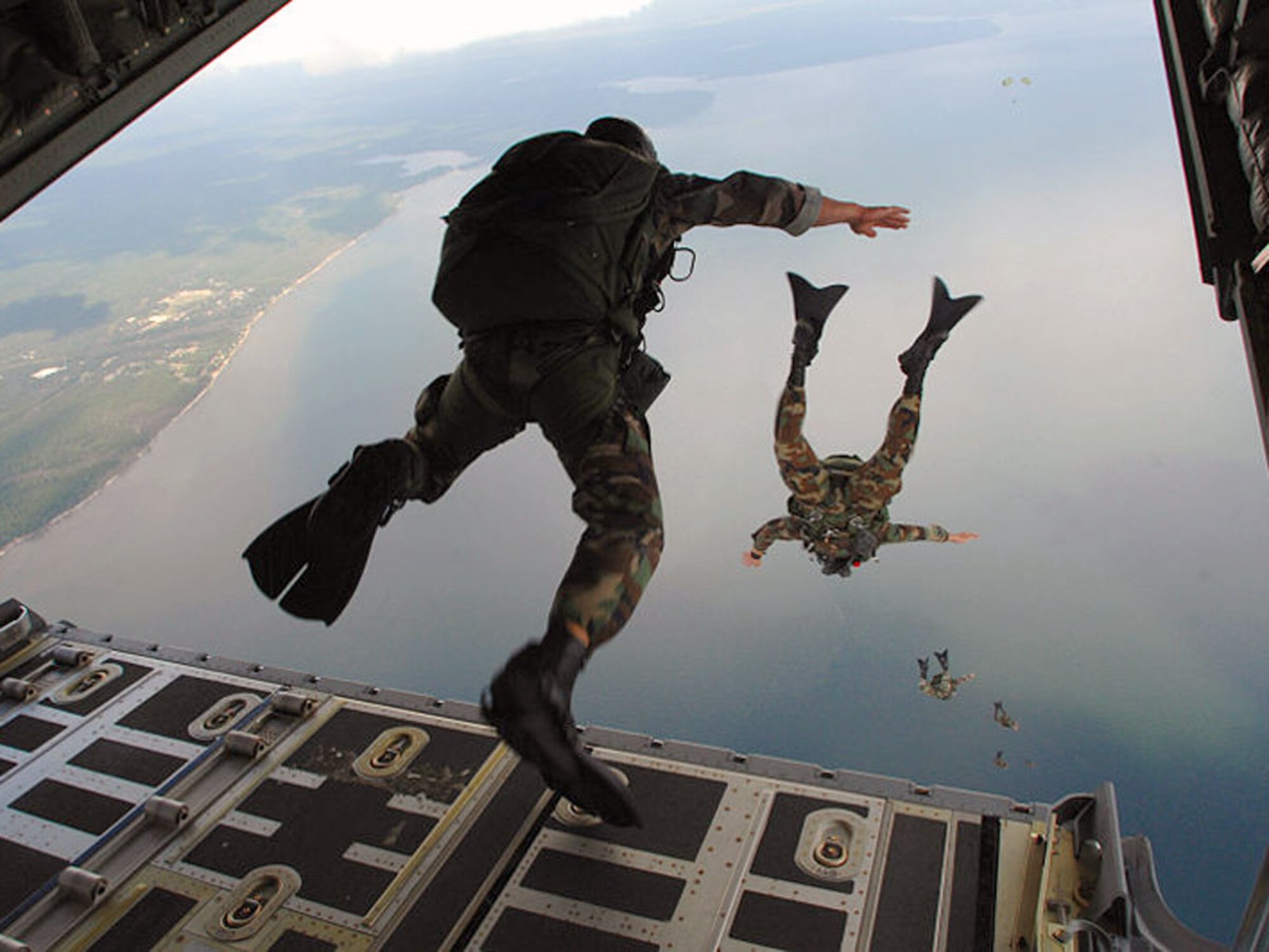 U.S. Air Force Pararescue and Combat Control Teams jump from aircraft during training in 2011 over Virginia.  On Dec. 6, 2012, the 317th Recruiting Squadron, based in Washington D.C., will be conducting tryouts for aspiring Special Operations Forces professionals at Joint Base Langley-Eustis, Va.  In a program known as the AF Special Operations Orientation, applicants will have the opportunity to qualify for a wide range of Battlefield Airmen positions in the Air Force. (Courtesy photo)