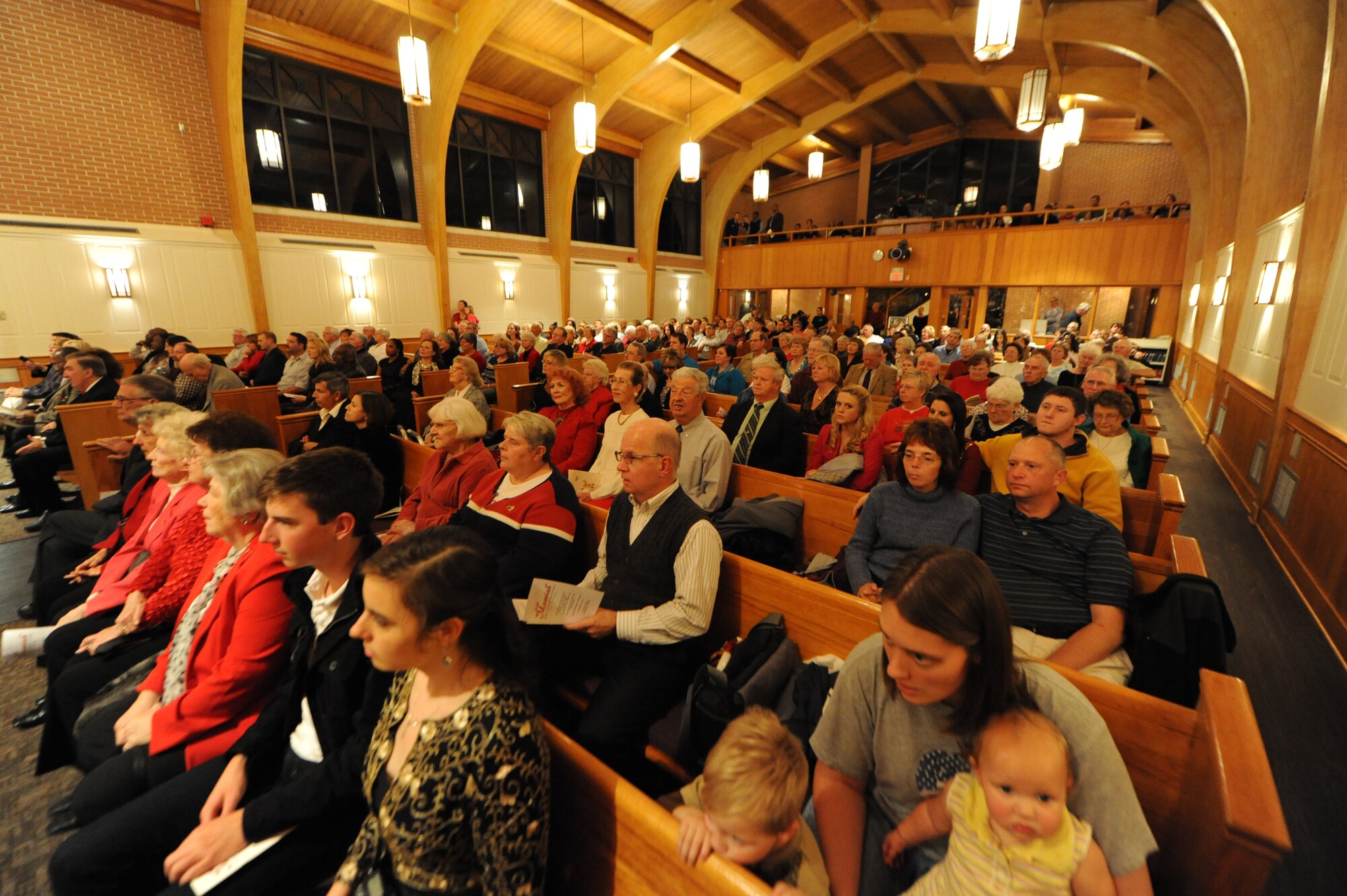 The Triangle Chapel is a full house during the Gulf Coast Messiah Chorus 60th Anniversary Celebration performance Nov. 29, 2012, at the Triangle Chapel, Keesler Air Force Base, Miss., under the direction of conductor Dr. Paul McGahie.  The Choir’s first performance began at Keesler and is now made up by musicians from both the military and civilian communities.  (U.S. Air Force photo by Kemberly Groue)