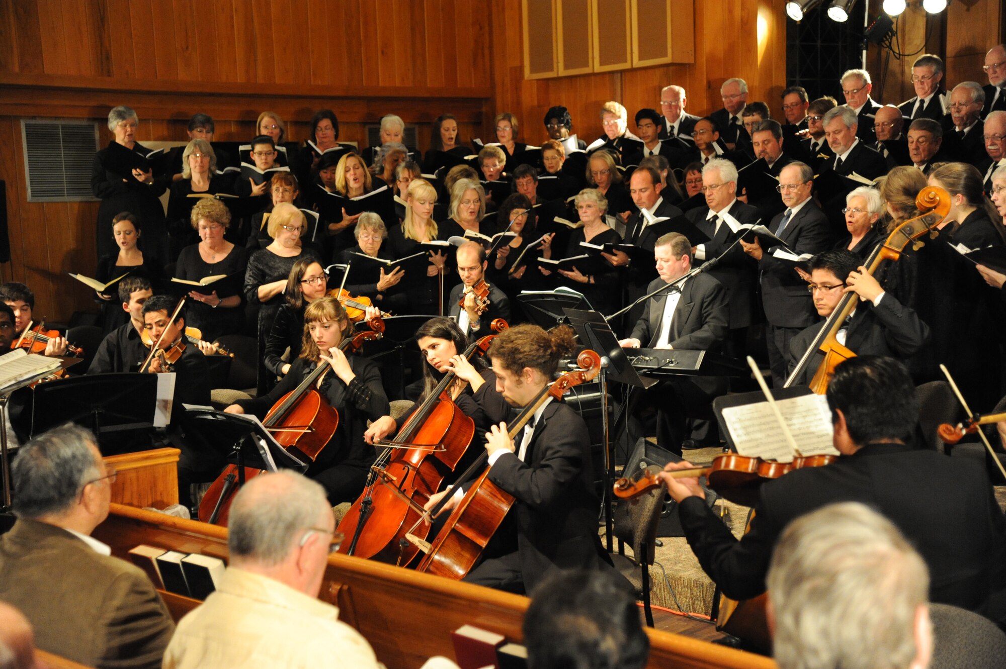 The Gulf Coast Messiah Chorus performs during a 60th Anniversary Celebration Nov. 29, 2012, at the Triangle Chapel, Keesler Air Force Base, Miss., under the direction of conductor Dr. Paul McGahie.  The Choir’s first performance began at Keesler and is now made up by musicians from both the military and civilian communities.  (U.S. Air Force photo by Kemberly Groue)