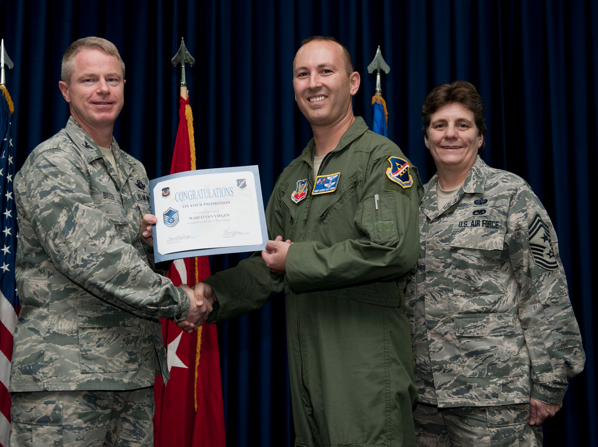 Marco Van Viegen, 414th Expeditionary Reconnaissance Squadron, is promoted to the rank of master sergeant Nov. 30, 2012, at the club complex ballroom at Incirlik Air Base, Turkey. (U.S. Air Force photo by Senior Airman Clayton Lenhardt/Released)